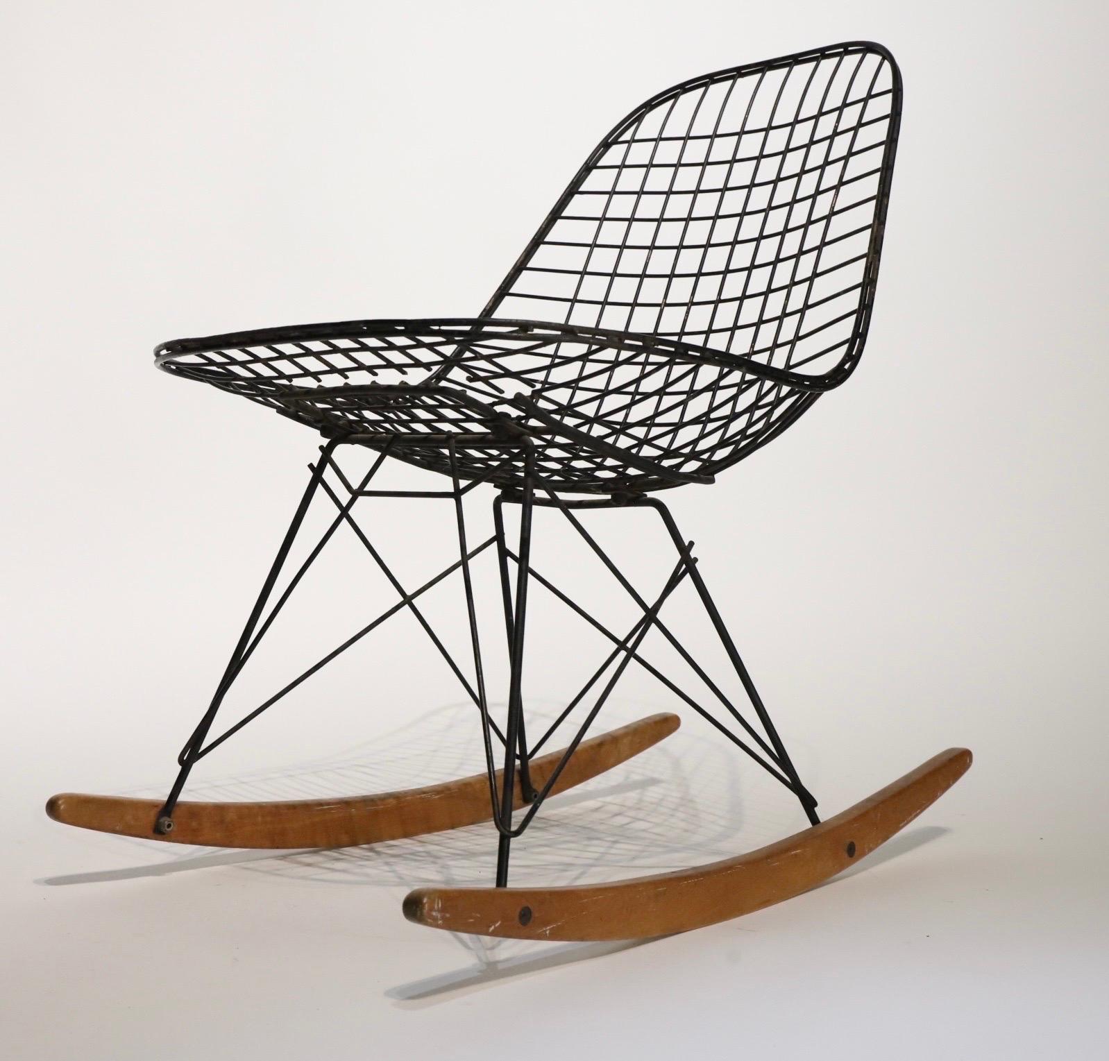 The iconic rocker or RKR by Charles and Ray Eames for Herman Miller. This example is being sold in original found condition with all its flaws and charactered patina. A wonderful addition to anyones Eames chair collection.
