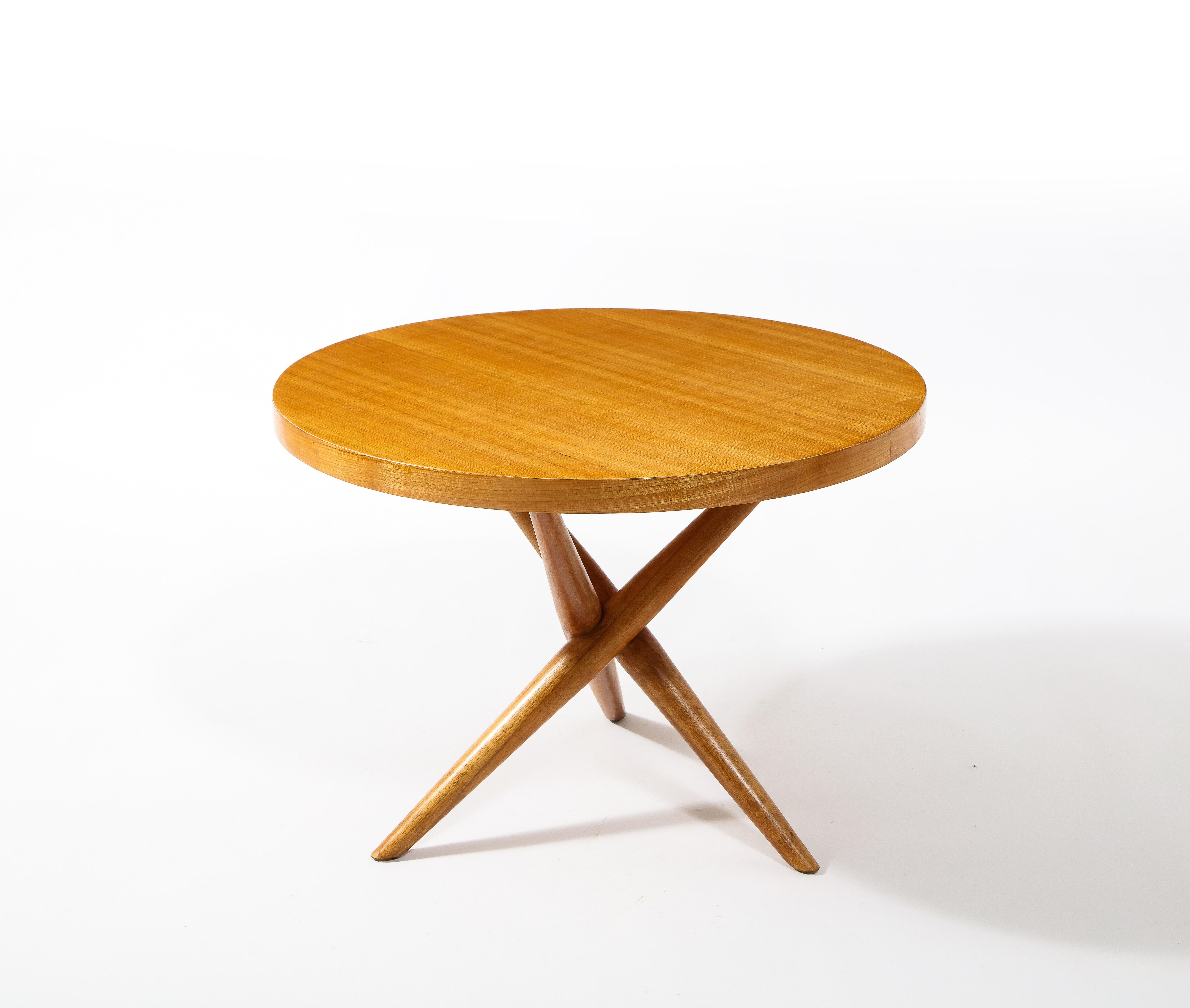 An early Robsjohn Gibbings tripod table for Widdicomb, the veneer is quite different than the usual plain walnut and it retains its original finish.