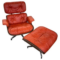Early Rosewood Eames 670 / 671 Chair and Ottoman Coral Leather