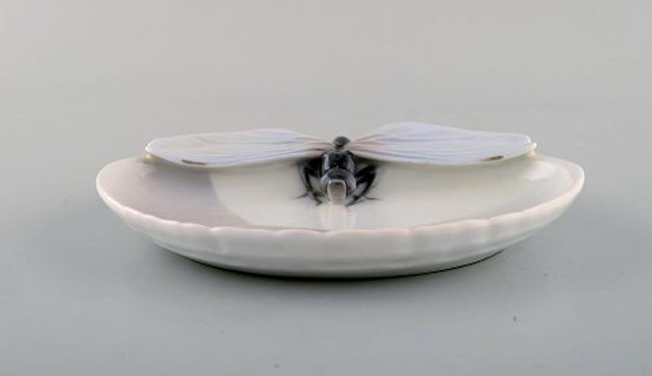Early Royal Copenhagen Art Nouveau bowl. Decorated with insect and spider, circa 1900.
In very good condition.
Stamped.
Measures: 17 x 3 cm.