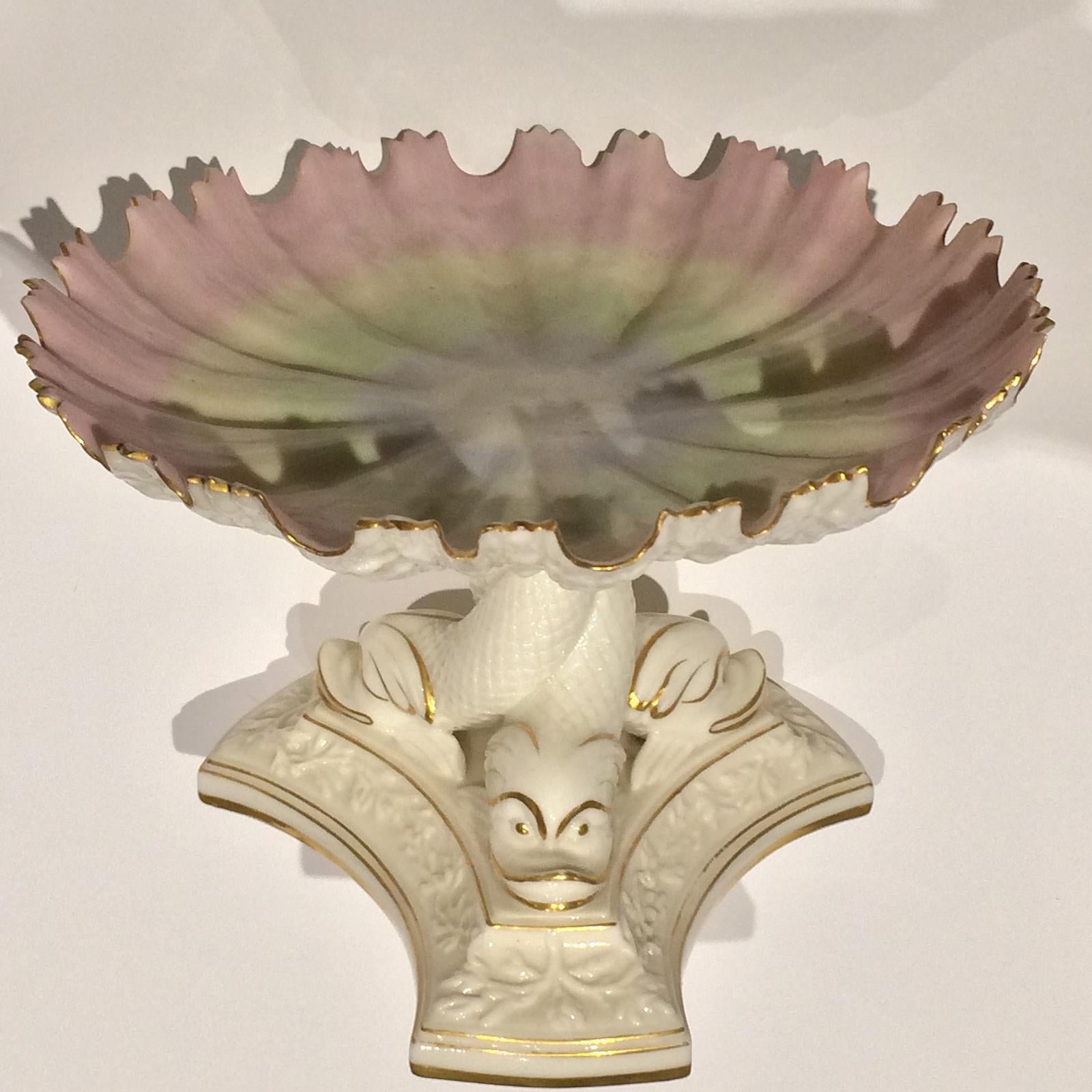 Exceptional Royal Worcester unmarked but other examples can be found with a painted mark, consisting of three Dolphins twisted into a column, with three splayed and stepped feet with raised floral decoration. The porcelain is so fine, it is