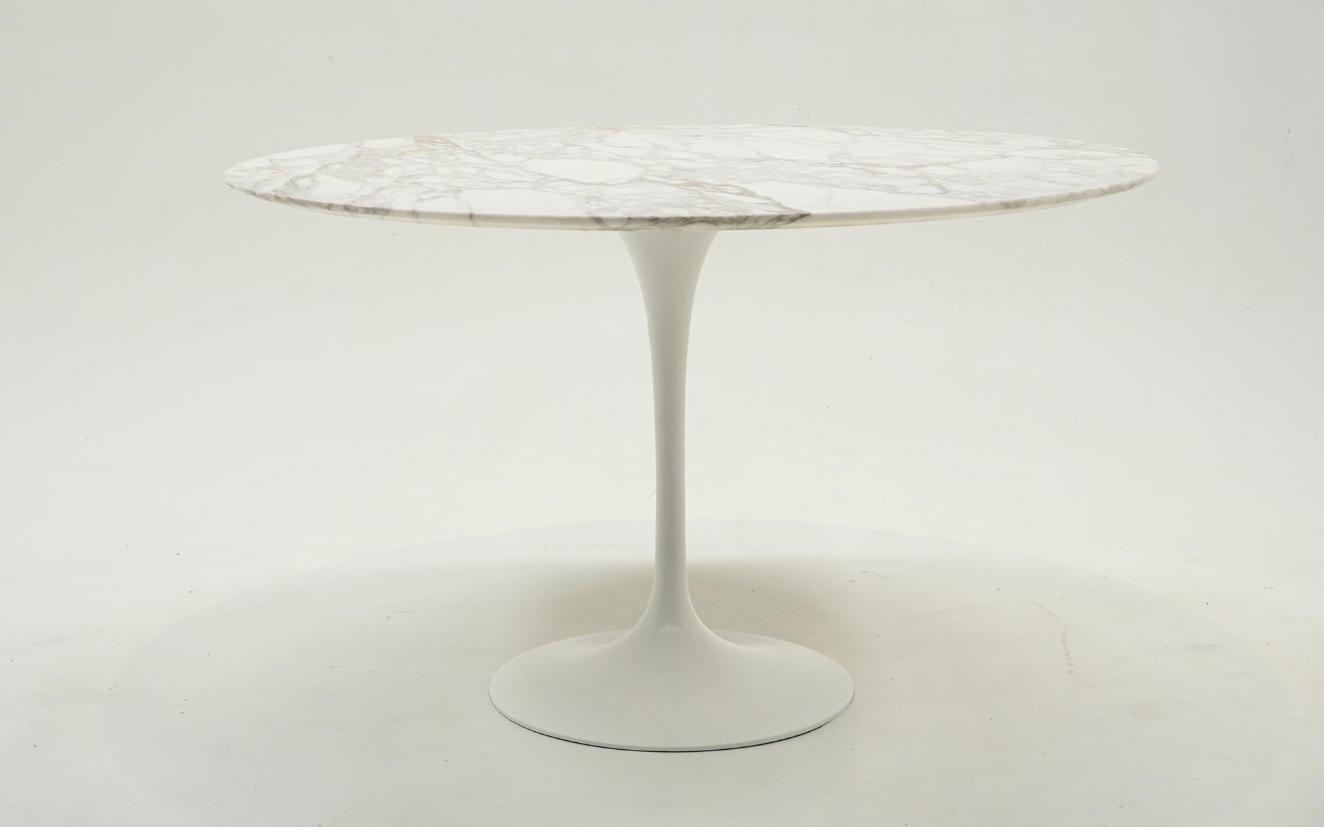 Early Edro Saarinen for Knoll 47 inch round white marble top dining table.  Early heavy cast iron base make this table super stable as opposed to the new production cast aluminum base.  The base has been expertly repainted and the original top is in
