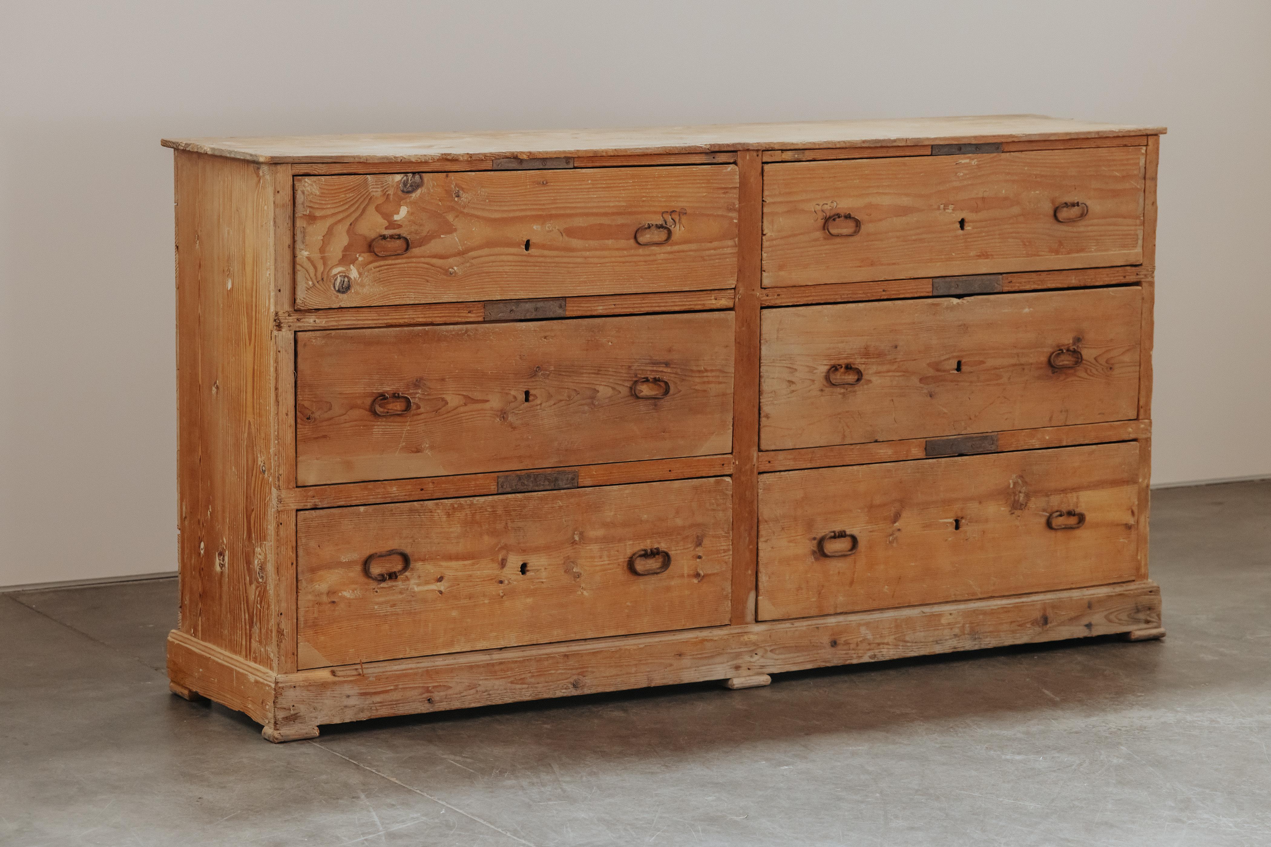 Early Sacristy Chest From Italy, Circa 1780.  Rare large model in solid pine with six drawers and original hardware.  Fantastic patina and use.