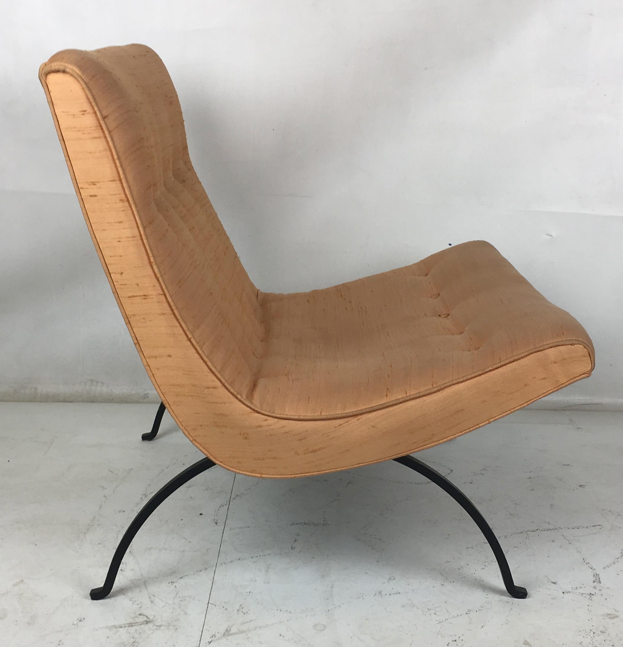 Early Scoop chair by Milo Baughman for Thayer Coggin with the early wrought steel type legs. It still wears its original cotton or silk upholstery that is a little worn and soiled. It's ready for something new.