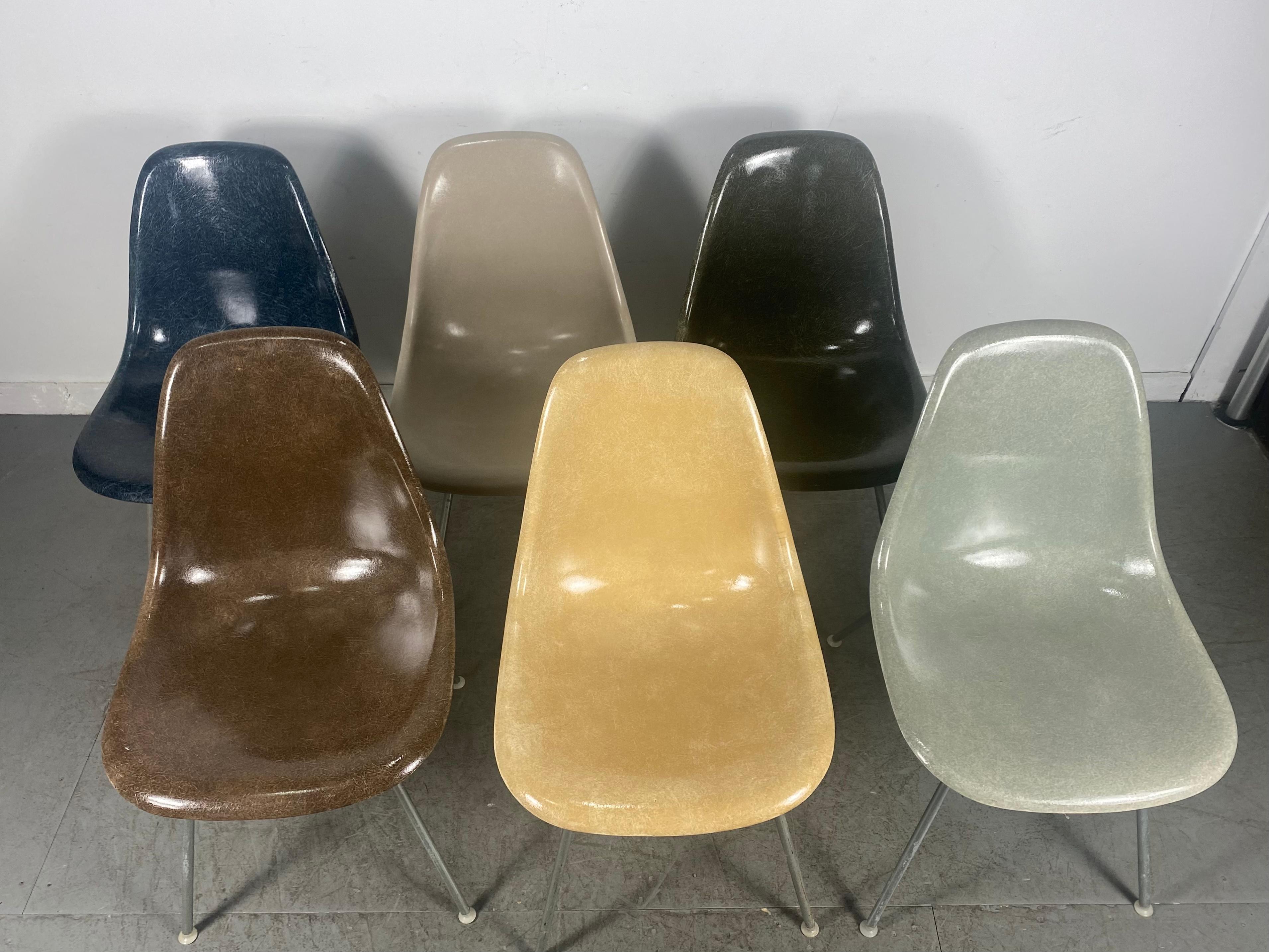 Nice early set of 6 fiberglass side shell chairs designed by Charles and Ray Eames manufactured by Herman Miller, Great colors, rarer, brown, blue, green, Amazing original condition, some retain original 