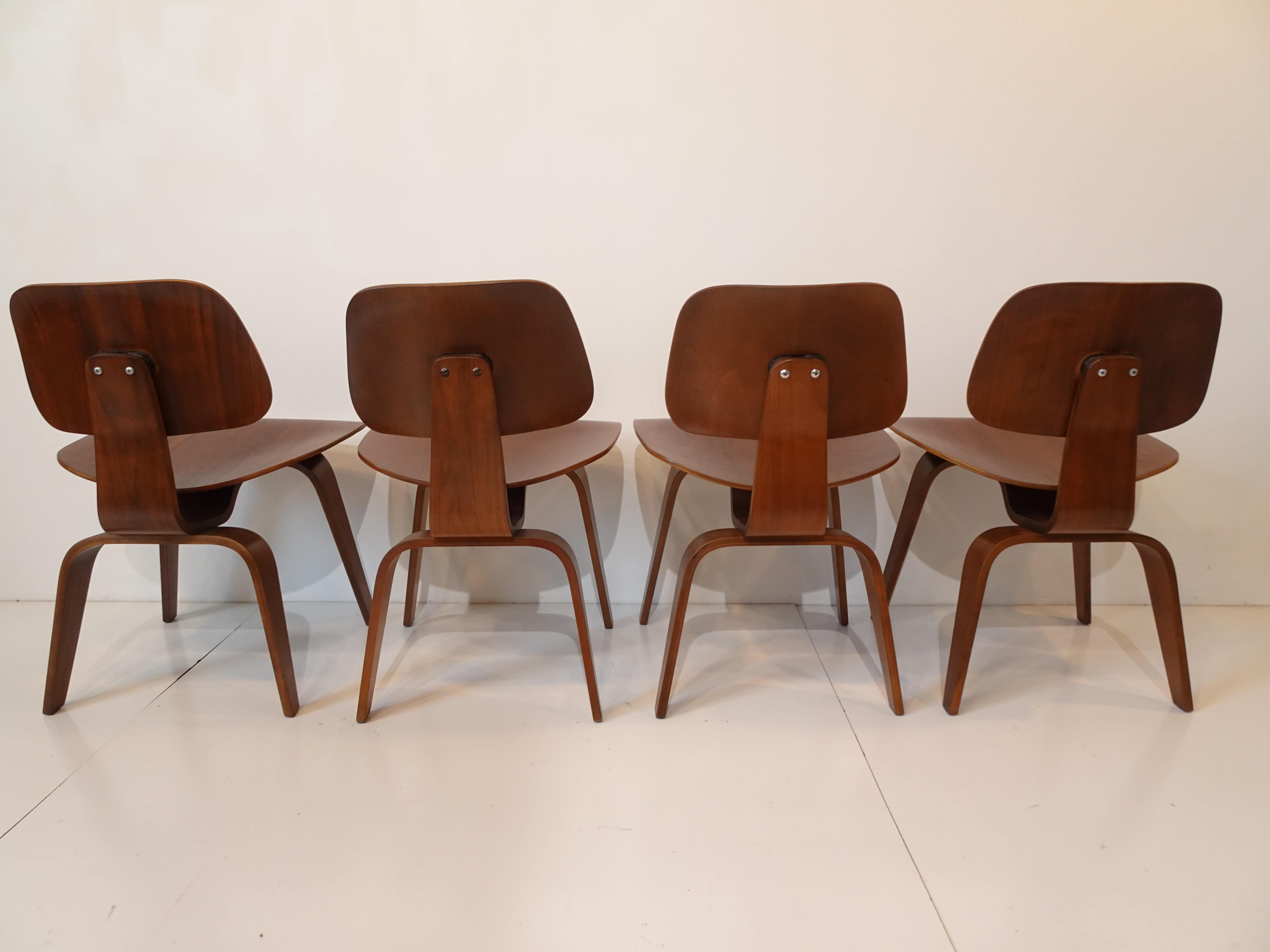 Early Set of Eames DCW Dining Chairs 4