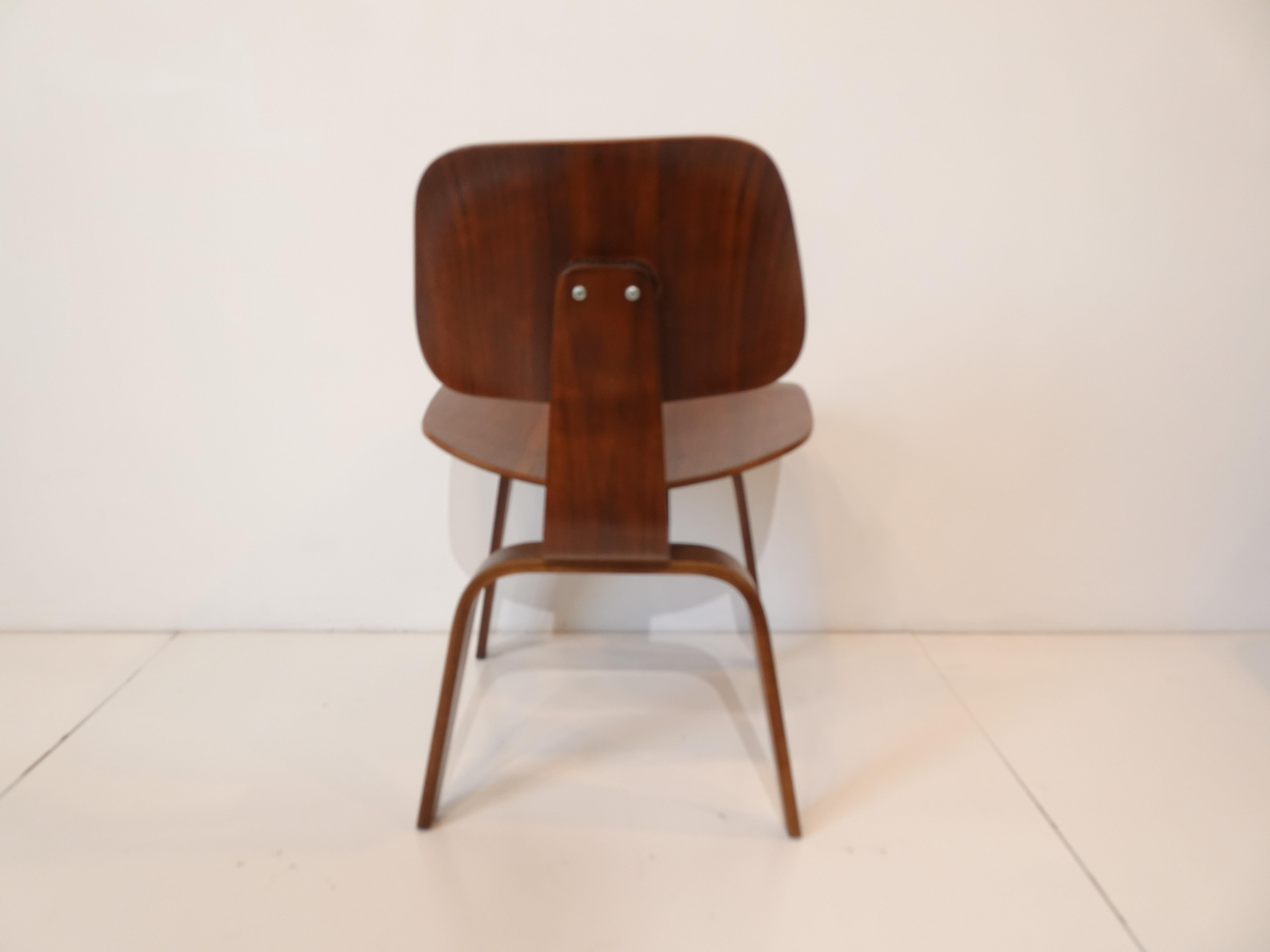 Wood Early Set of Eames DCW Dining Chairs