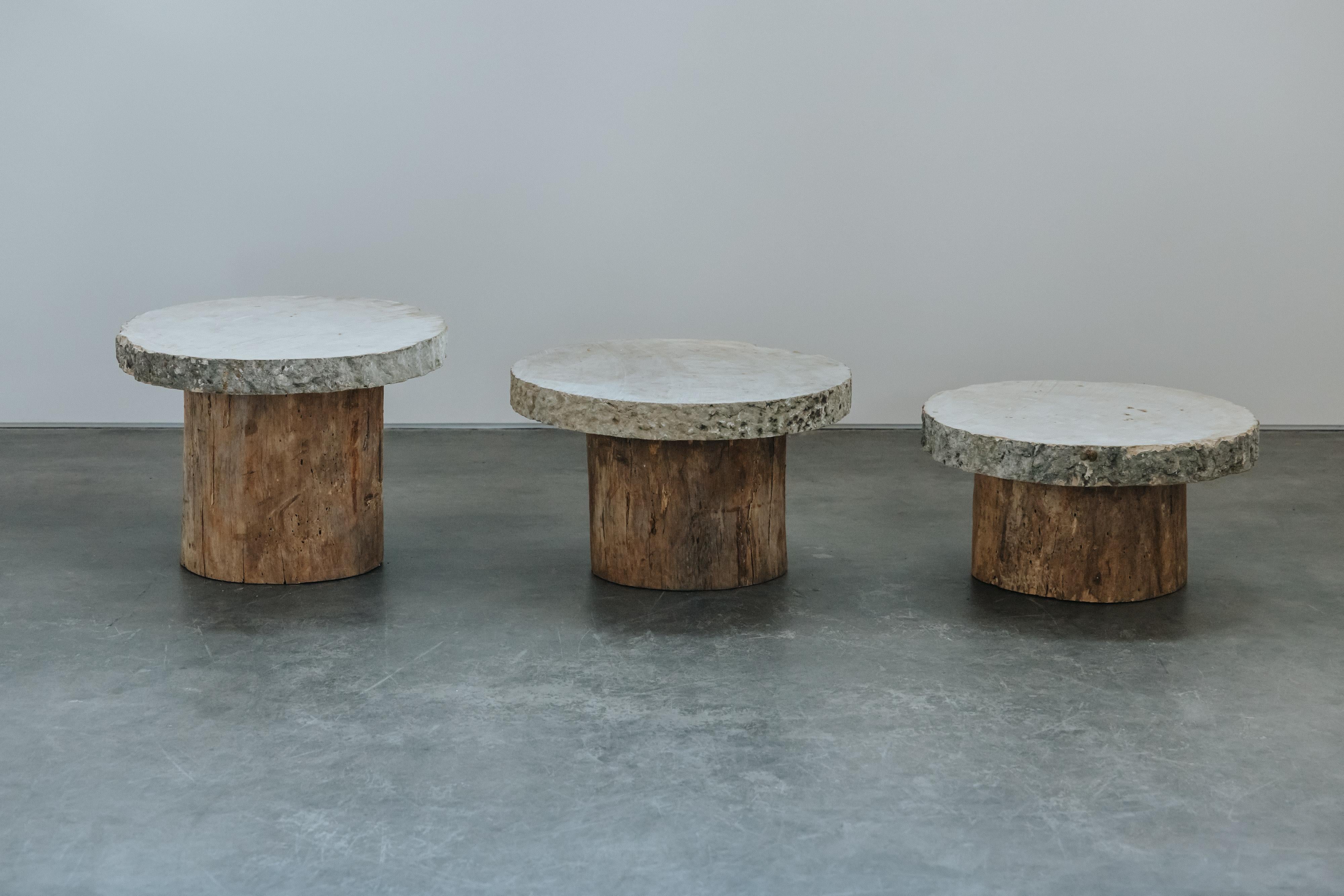 Early Set Of Oak And Stone Slab Coffee Tables From France, Circa 1880.  Solid Marble stone slab top resting on oak pedestal bases.  Excellent condition.

Height in description is of the largest model.  The other two measure H19 / W31 & H16 / W29.

