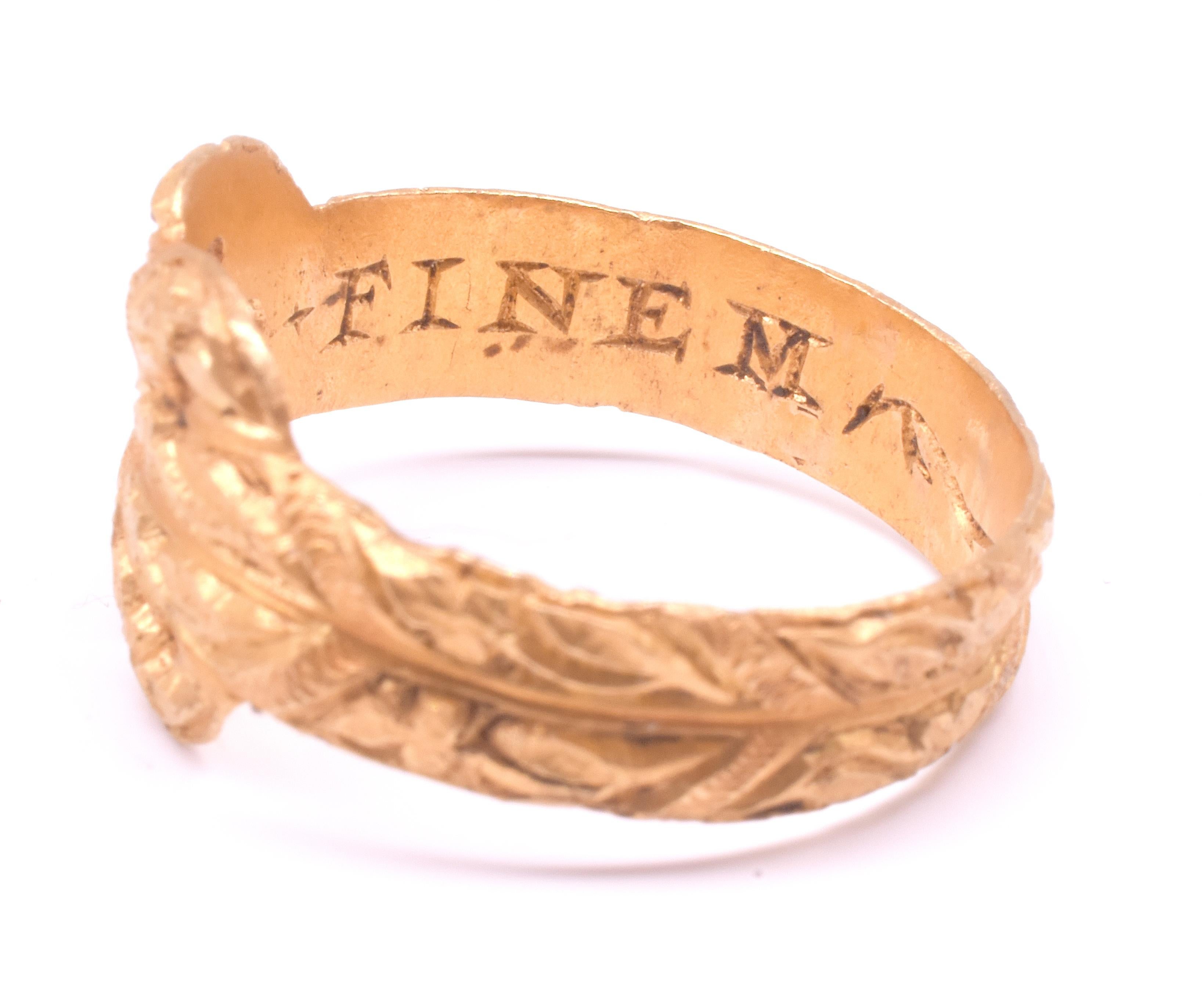 Anillo Posey de principios del siglo XVII con forma de nudo de amor 