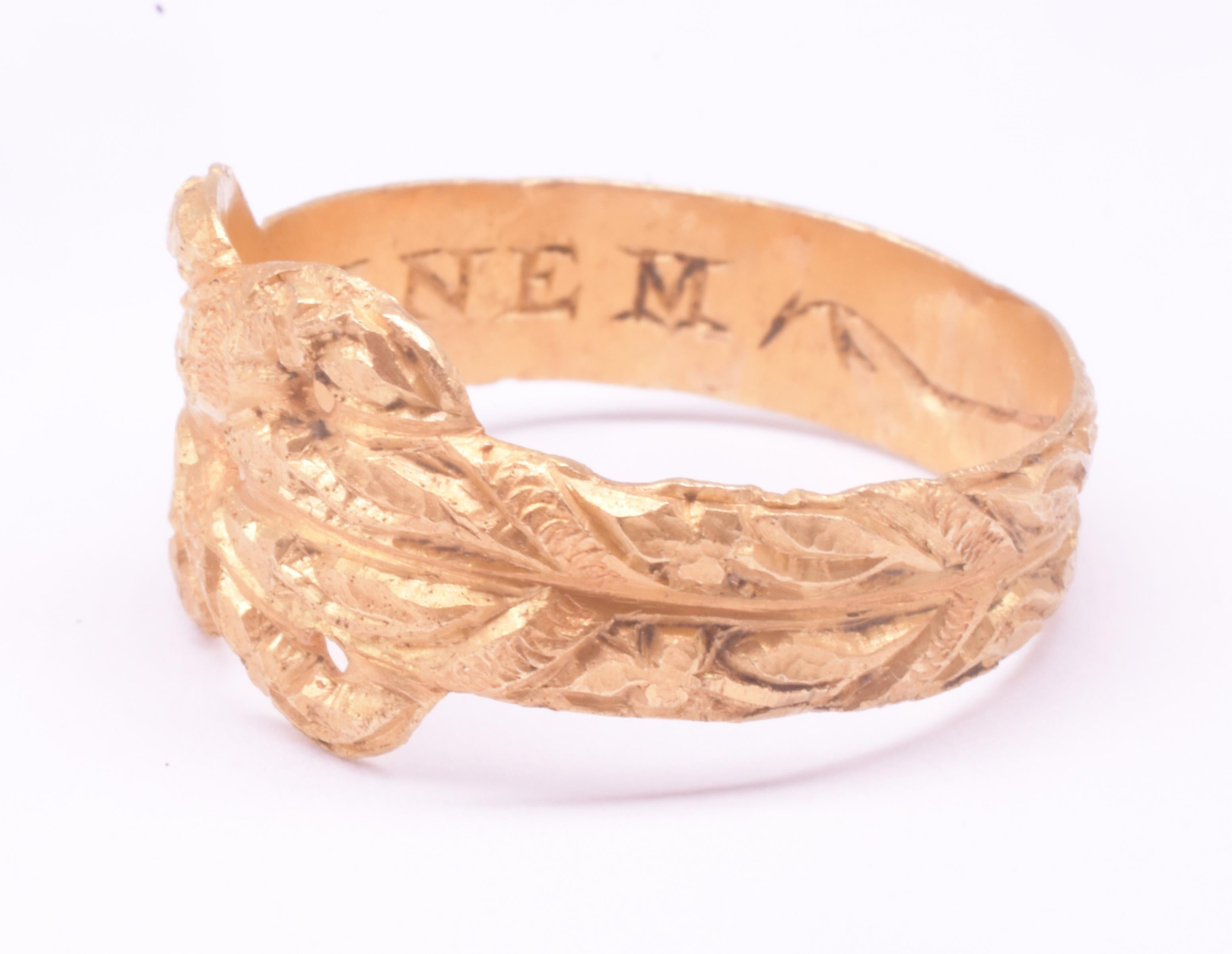 Anillo Posey de principios del siglo XVII con forma de nudo de amor 