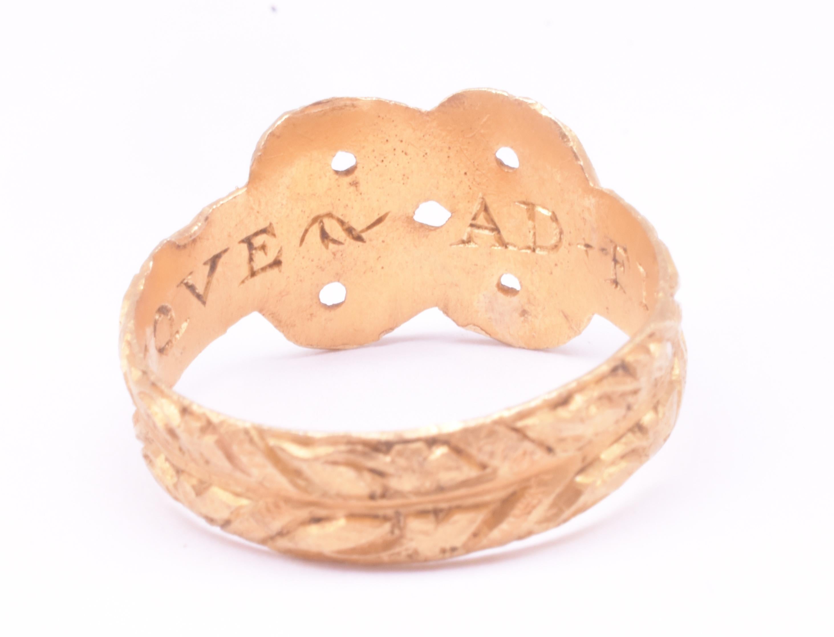 Anillo Posey de principios del siglo XVII con forma de nudo de amor 
