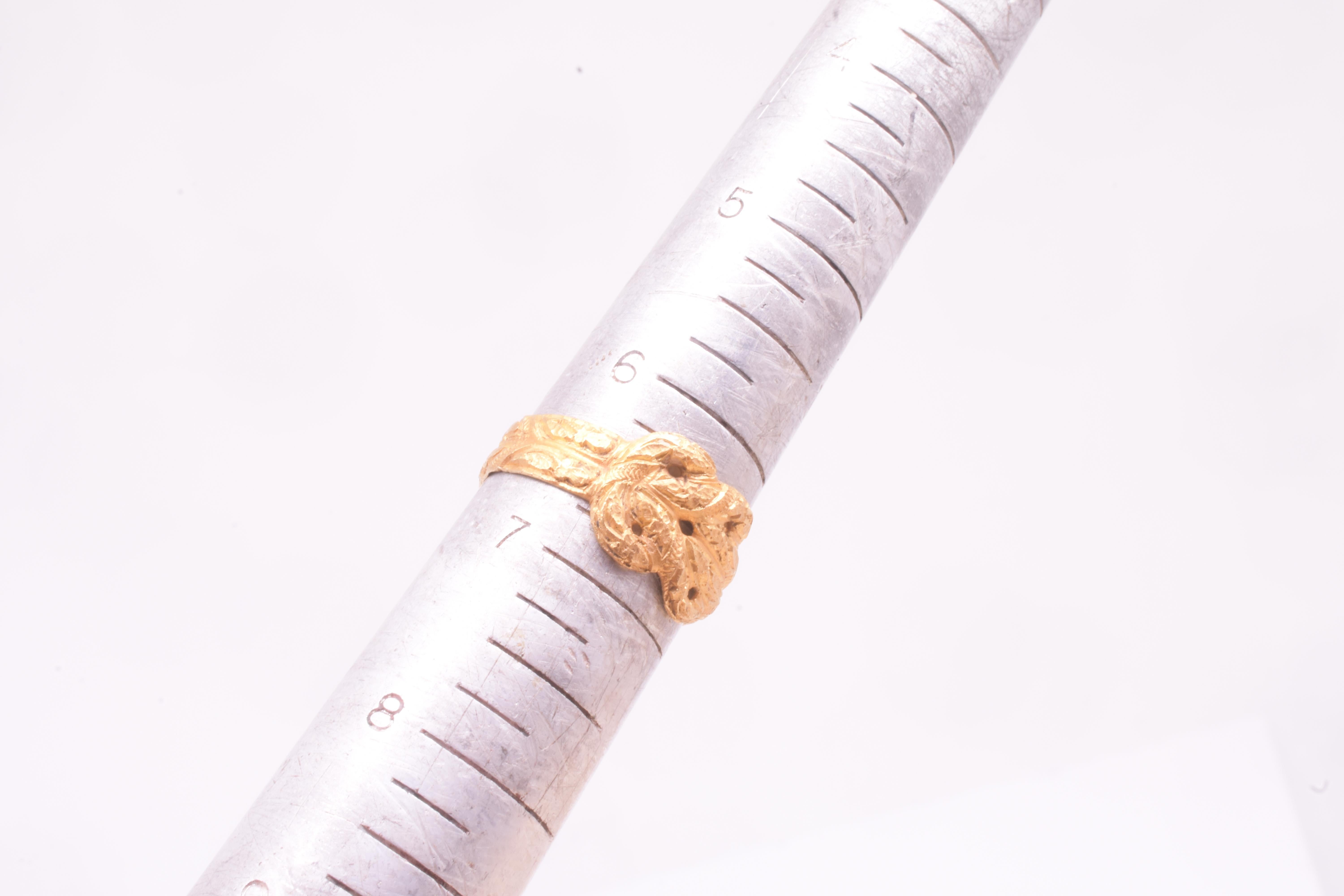 Anillo Posey de principios del siglo XVII con forma de nudo de amor 