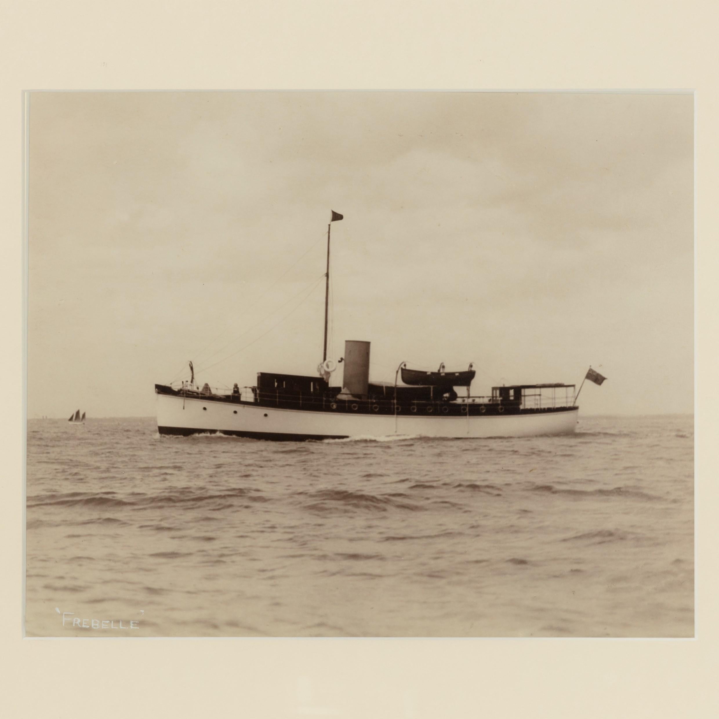 Early silver gelatin photographic print of the Gentleman’s yacht Frebelle in the Solent, by Kirk and sons Cowes, signed in white ink.