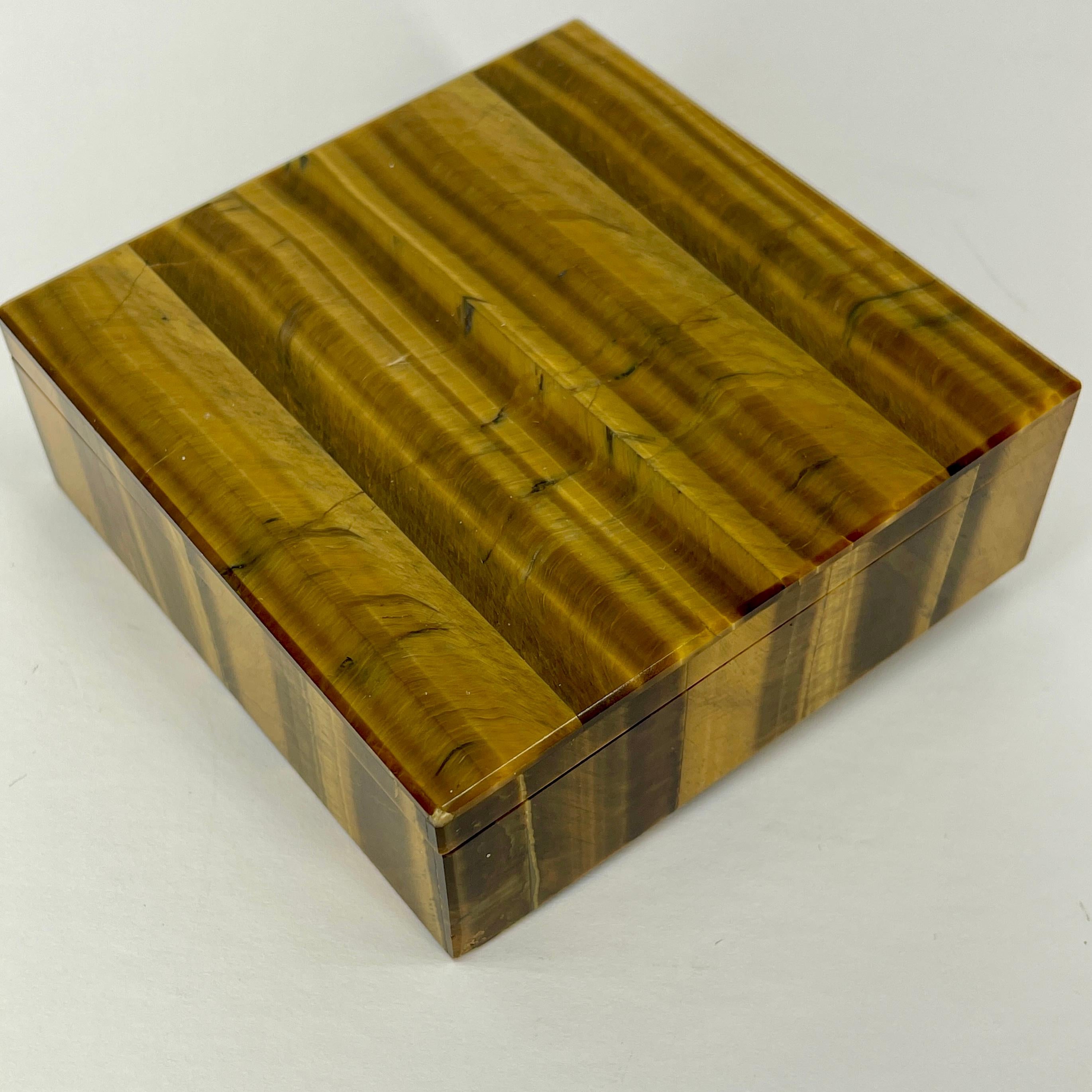 Charming Italian tiger eye jewelry or cigarette box. This box is square with its original brass hardware.