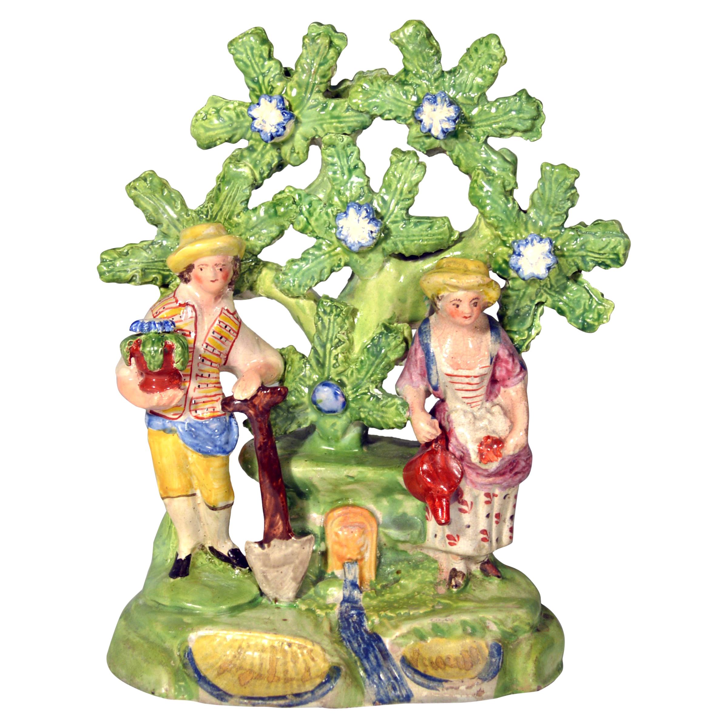 Early Staffordshire Bocage Figure Group of Gardener and Companion, circa 1825
