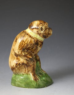 Early Staffordshire "Wood Family" Figure of a Monkey, 18th Century