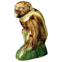Early Staffordshire "Wood Family" Figure of a Monkey, 18th Century 