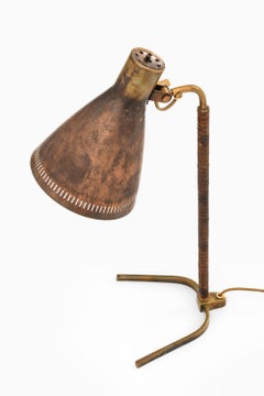 Early Table Lamp in Brass and Leather by Paavo Tynell, 1950's
