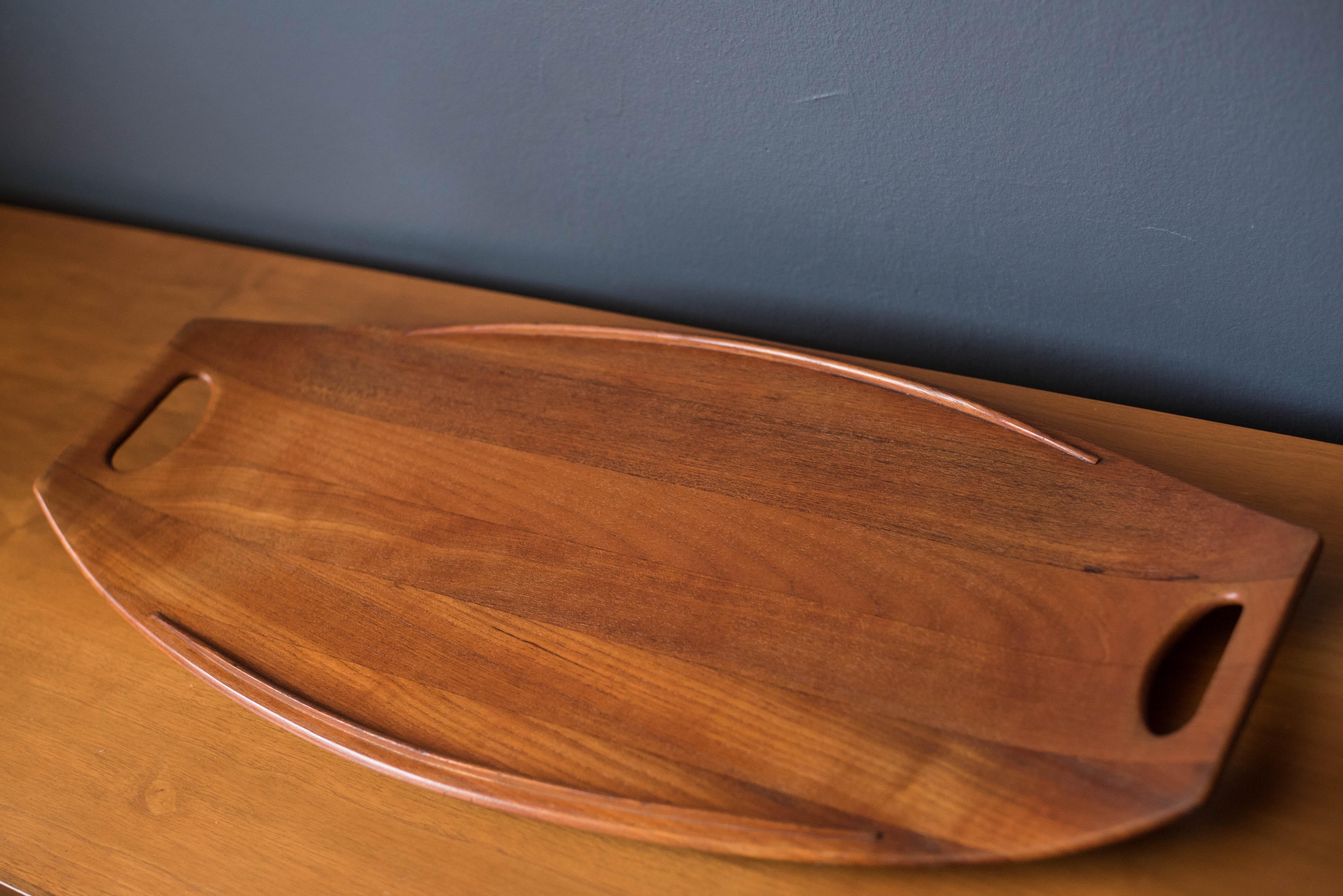 Vintage staved decorative tray #803 designed by Jens Quistgaard for Dansk. This early designed piece is the larger version and is made of solid planked teak.