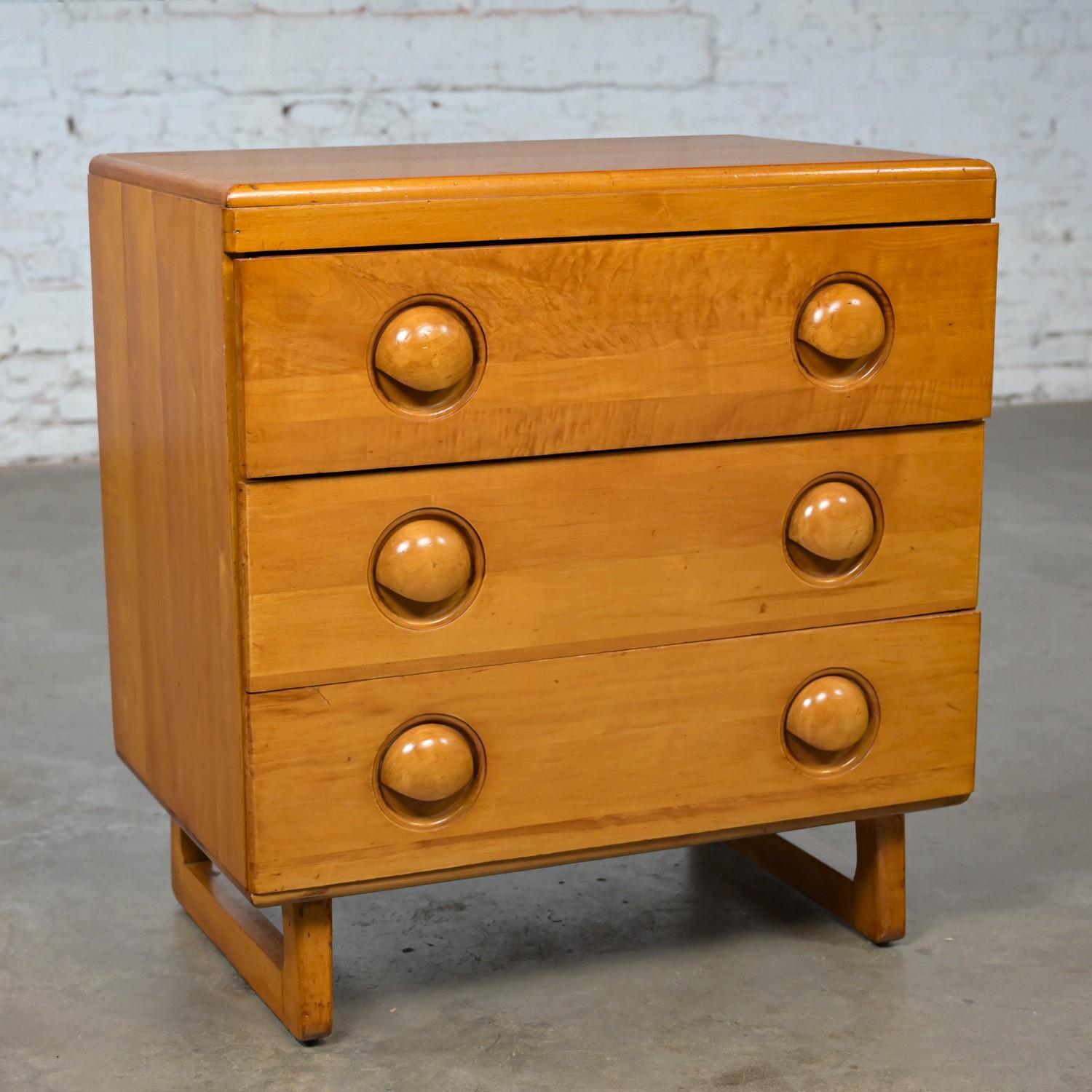 Wonderful Early to Mid-20th Century Art Moderne solid maple small 3 drawer chest or cabinet in the style of Bissman and after Russel Wright for Conant Ball. This piece has been attributed based upon archived research including online sources,