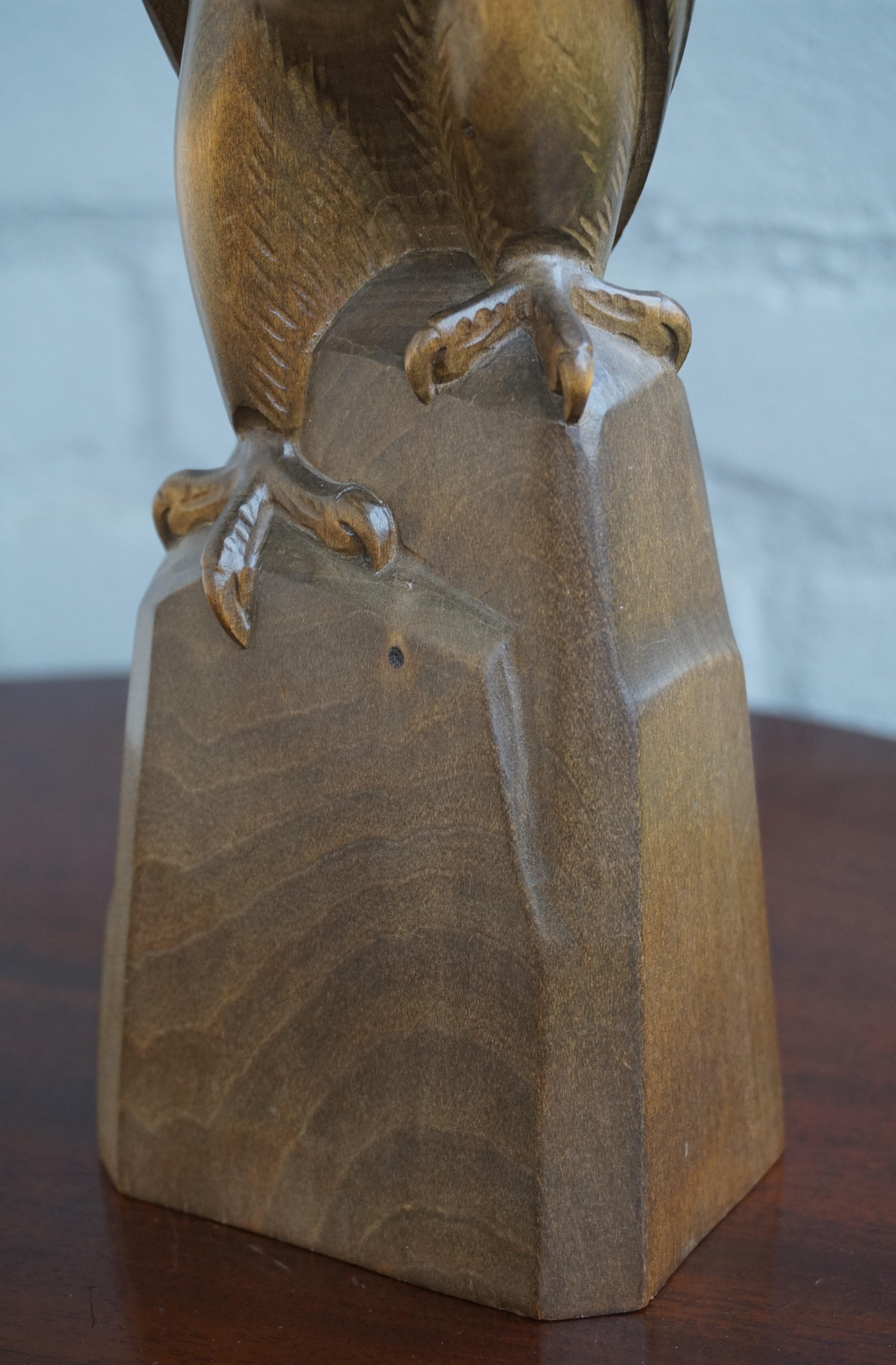 Wood Early to Mid-20th Century Hand Carved Black Forest Sitting Eagle Sculpture For Sale