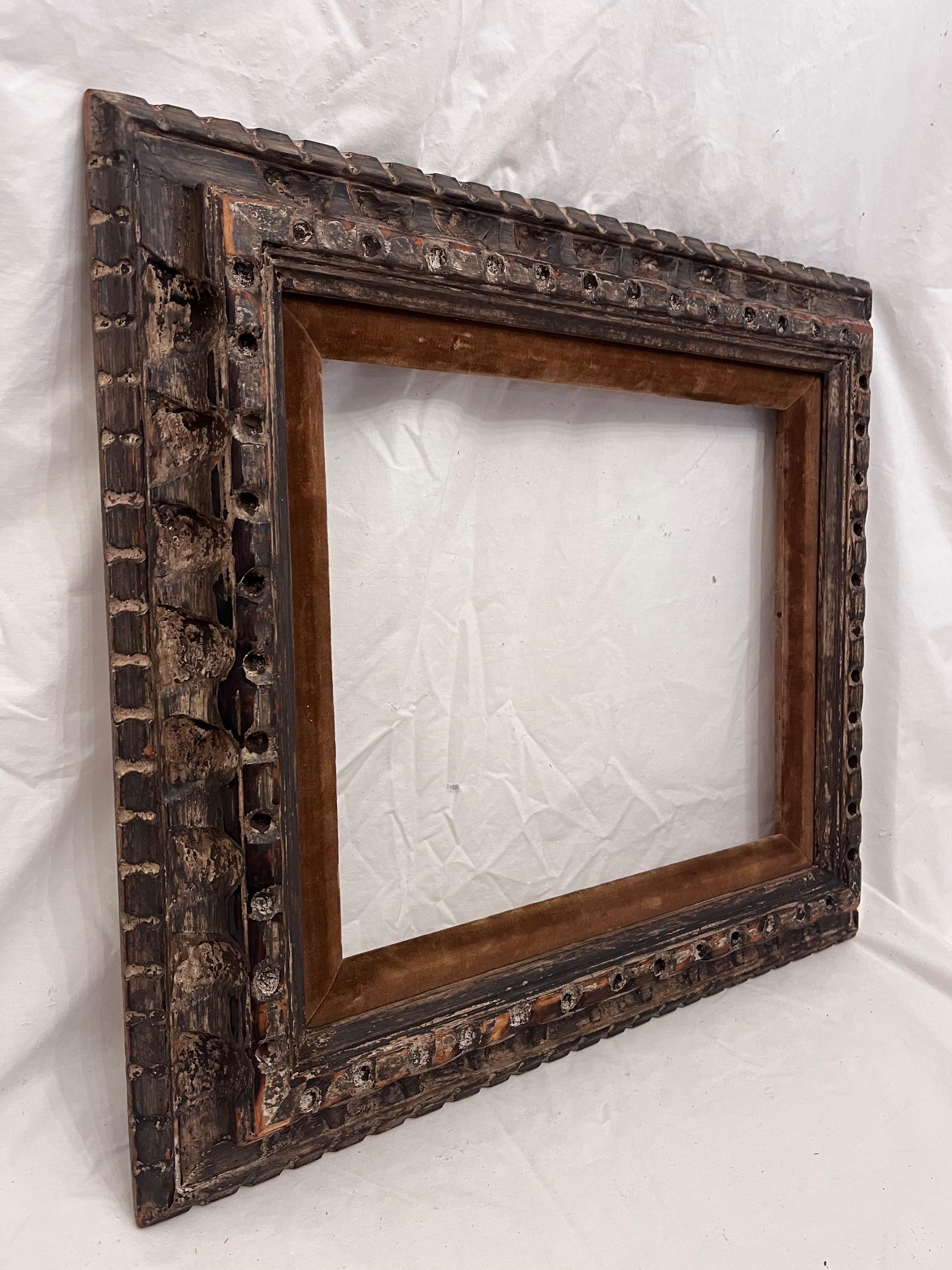 A beautiful and vintage early to mid 20th century circa 1940's American Modernist style hand carved, finished corner picture frame. The rabbet size (size that holds the art) is 13.25