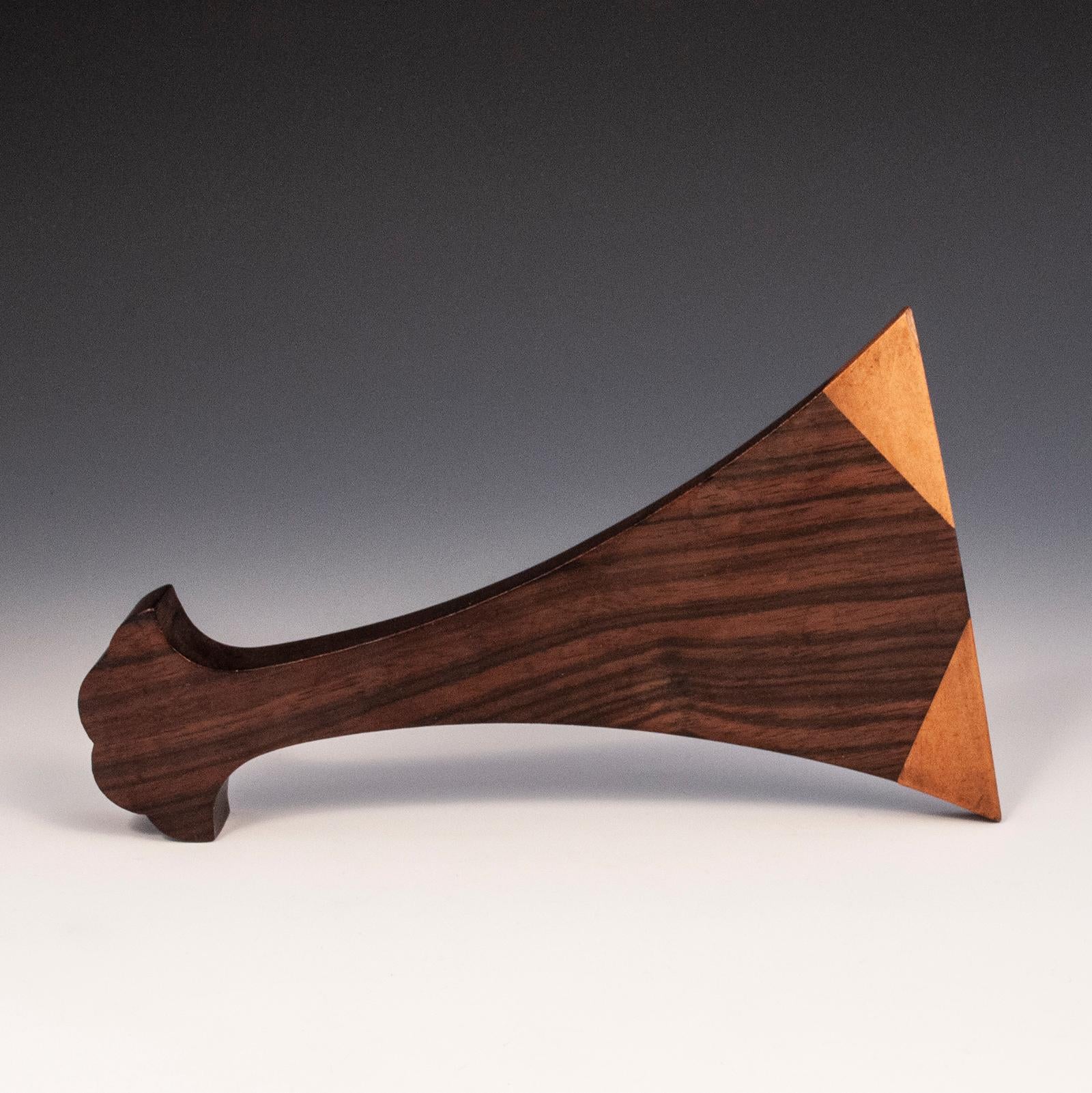 Rosewood Plectrum for Biwa, Japan

A beautiful rosewood plectrum used in plucking the strings of a chikuzen-biwa, which is a 4-5 string fretted lute used traditionally for narrative story-telling. The tips are made of notched boxwood, and some