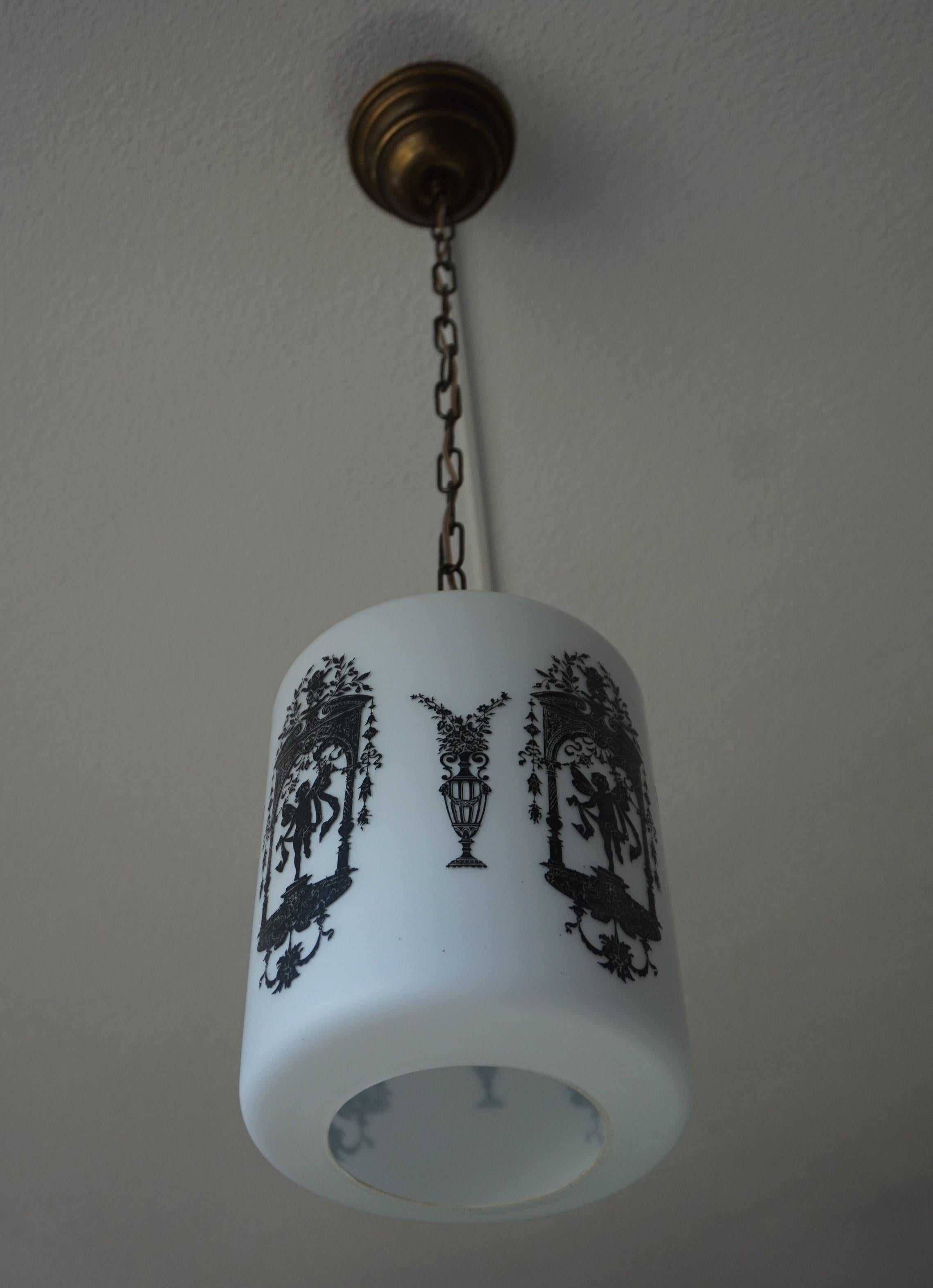 Early to Mid-20th Century Snowy White Glass Pendant with Black Renaissance Decor For Sale 10