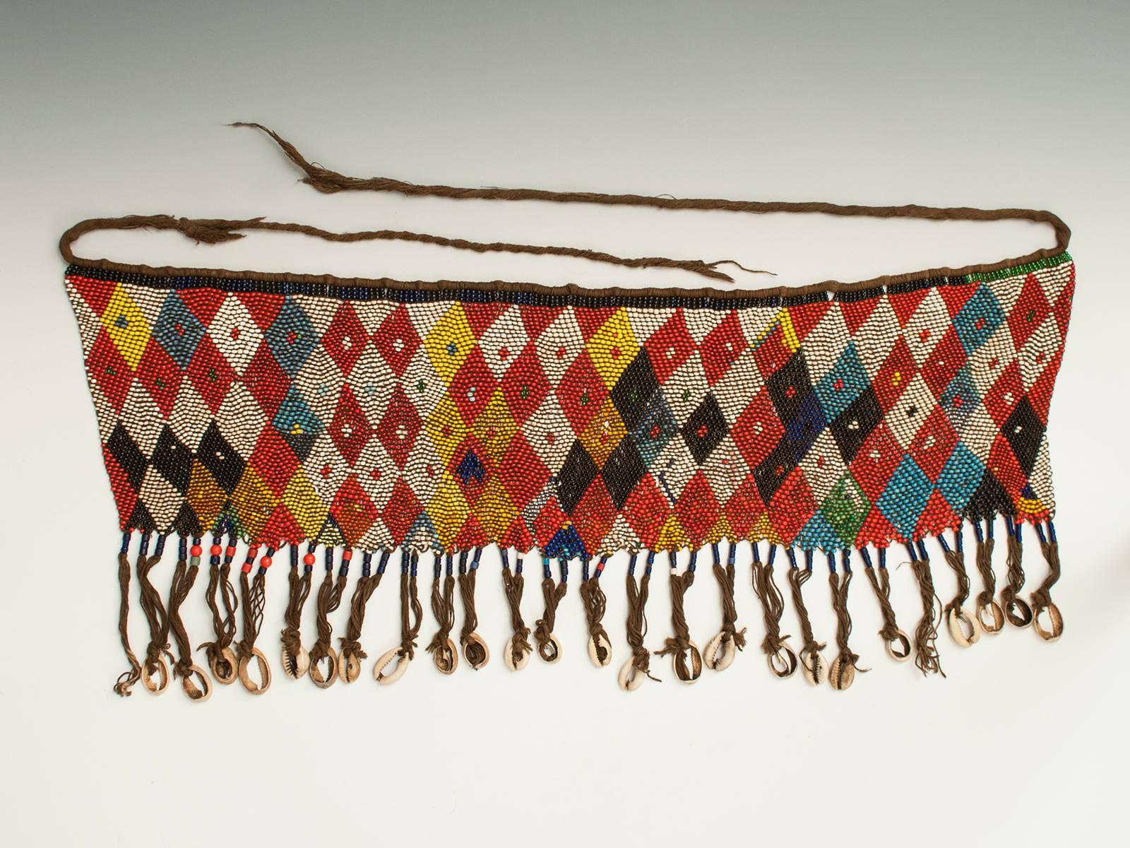 Offered by Zena Kruzick
Early to mid-20th century tribal glass-beaded modesty apron cache-sexe, Bana Guili people, Mandara Mountains, Cameroon

A colorful example of the modesty aprons worn by married women to special ceremonial occasions.