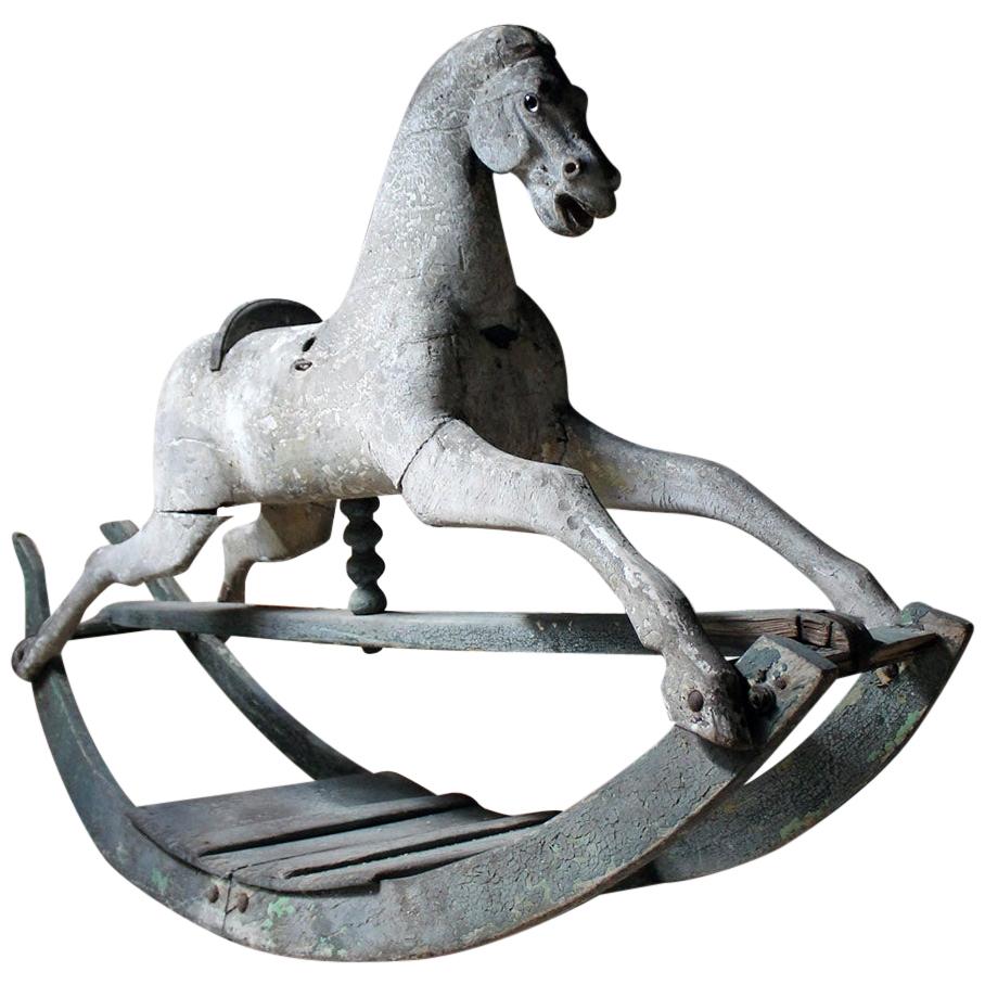 Early to Mid-19th Century Grey Bow Rocking Horse, circa 1830-1840