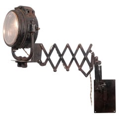 Early Truck Headlamp on Scissor Wall Mount