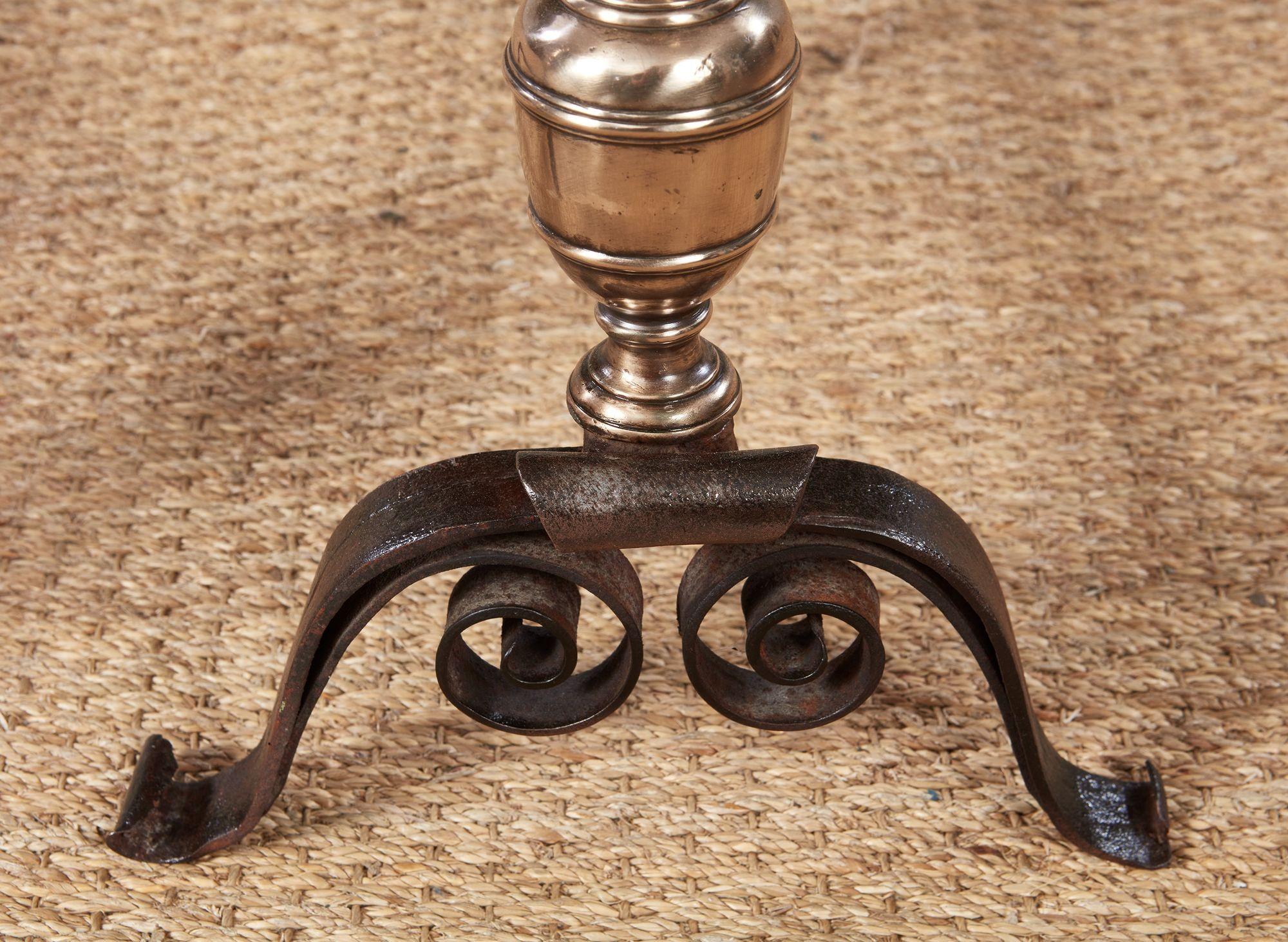 18th Century Early Turned Bronze and Scrolled Iron Andirons For Sale