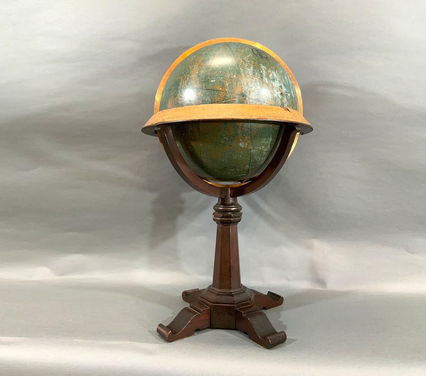 Fine library globe with makers logo from Atlas School Supply Co., Chicago. Hardwood base with rich finish and nice detail. Celestial globe with equatorial ring. Showing zodiac markings.

Weight: 7 LBS
Overall Dimensions: 26