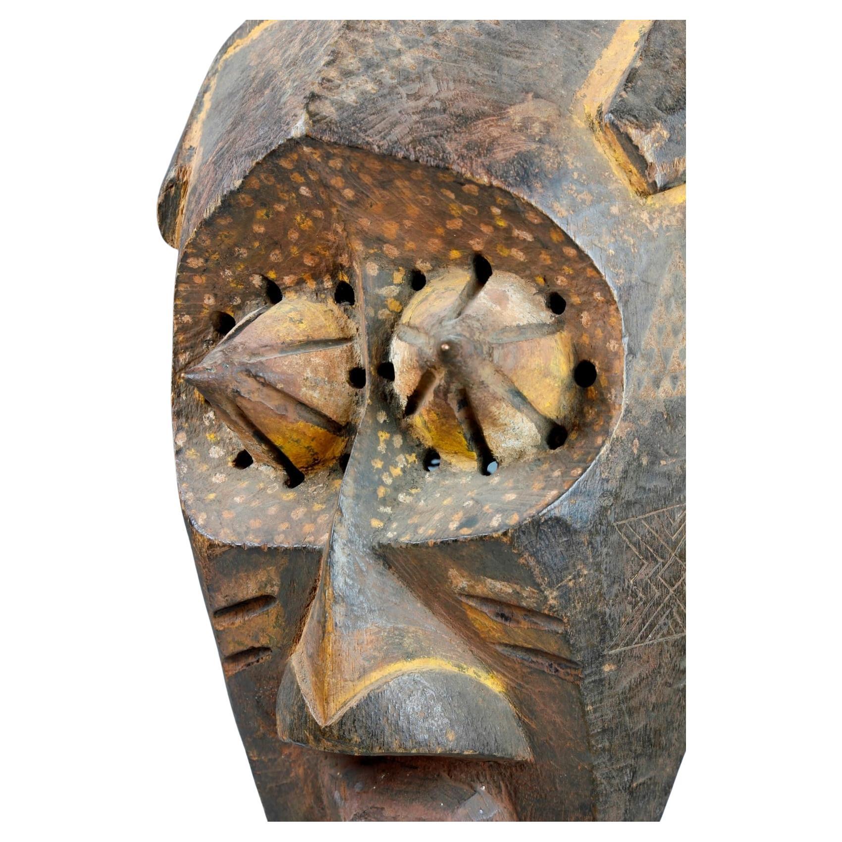 This striking early twentieth-century mask, from the Kete culture in the Democratic Republic of the Congo, previously belonged to the private collection of Penn Kent, the former Director of the Bank of England. The mask has been finely carved with a