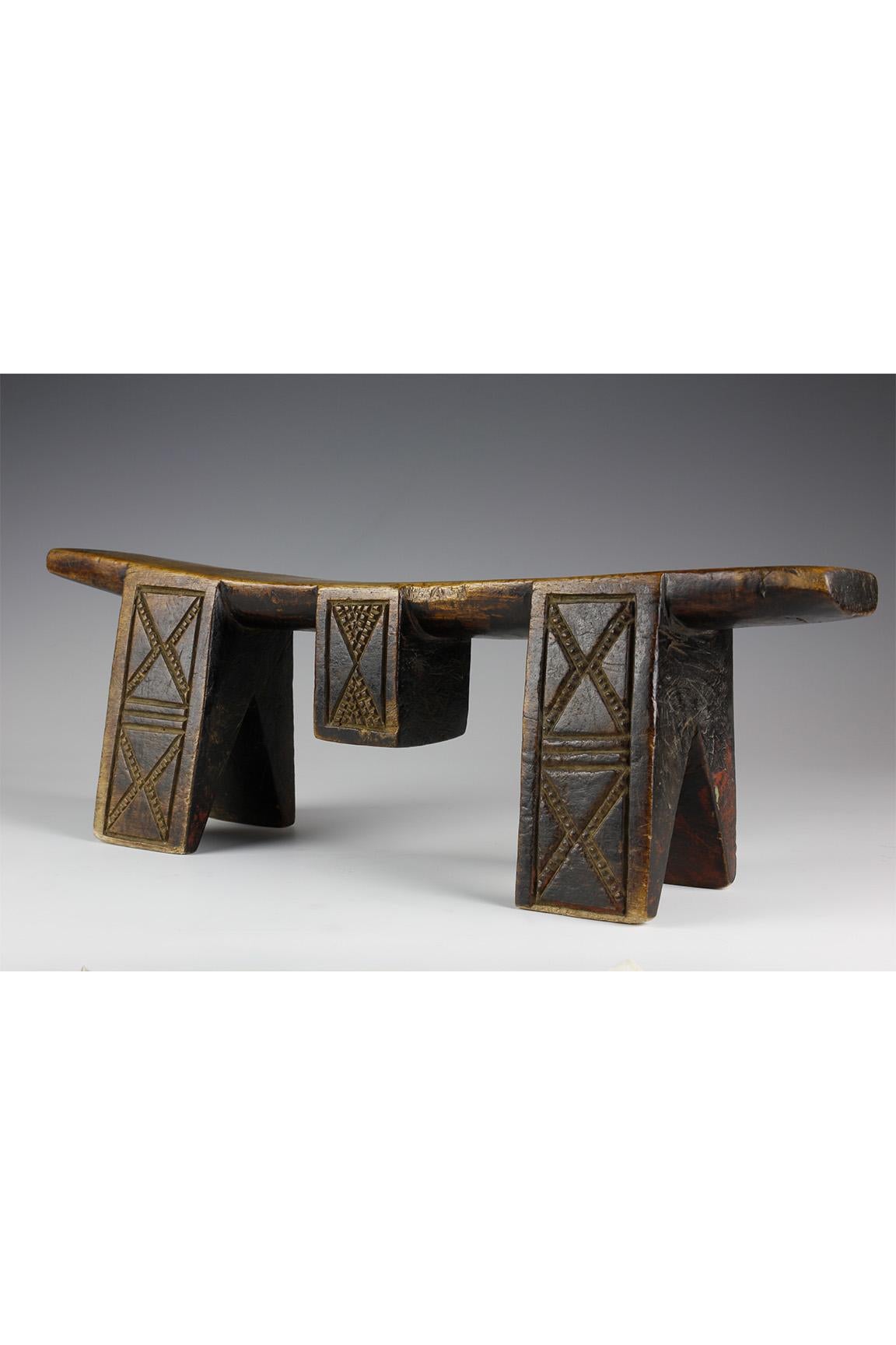 This fine early twentieth-century headrest, from the Zulu culture in South Africa, was previously part of a selection of exceptional Southern African art in the Terence and Bernice Pethica Collection. The headrest has been beautifully carved,