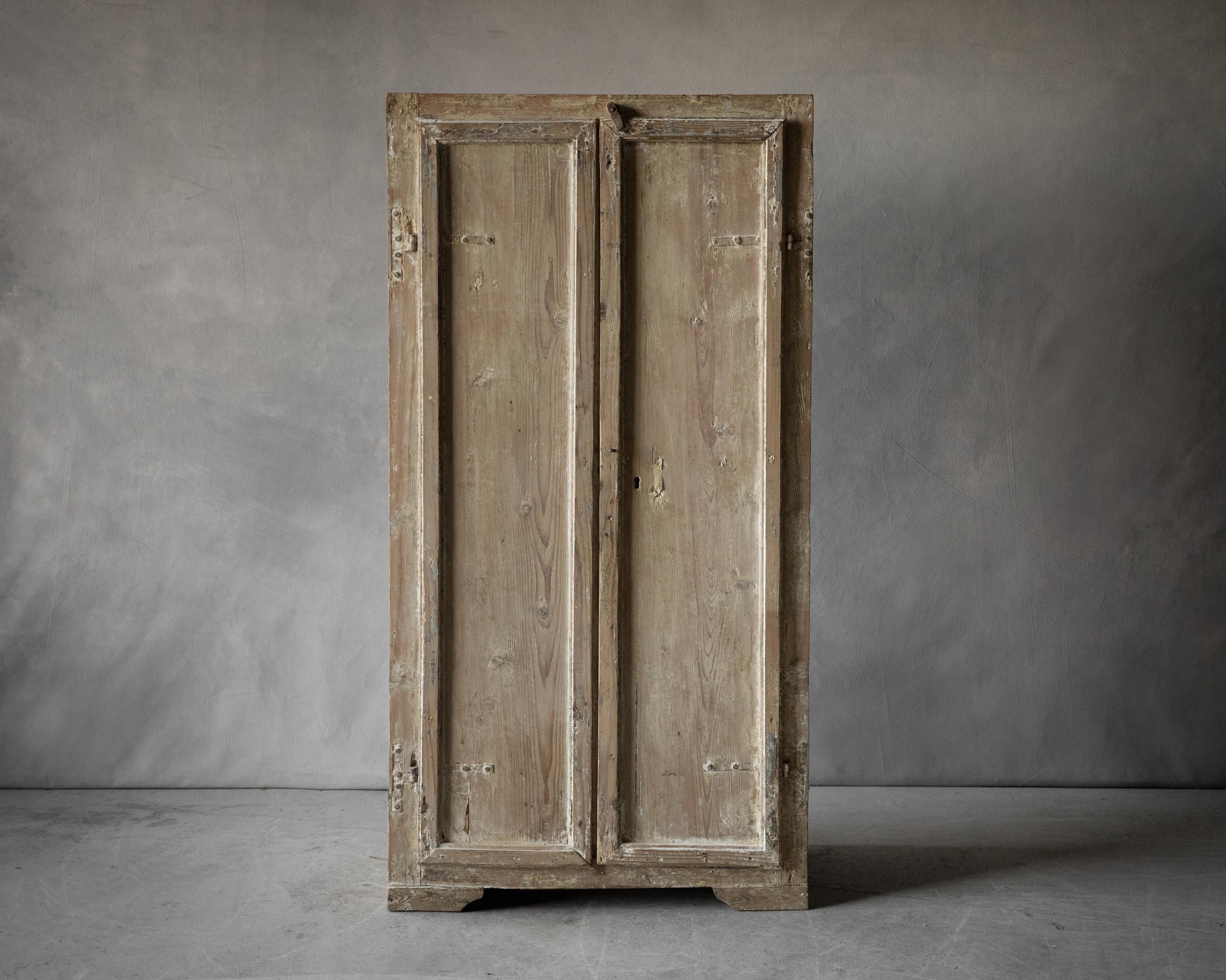 Early Two Door Cabinet From Italy, circa 1800. Solid pine construction with fantastic original paint and hardware.