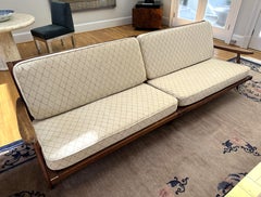 Antiguos dos sofás seccionales de nogal con cojines de George Nakashima