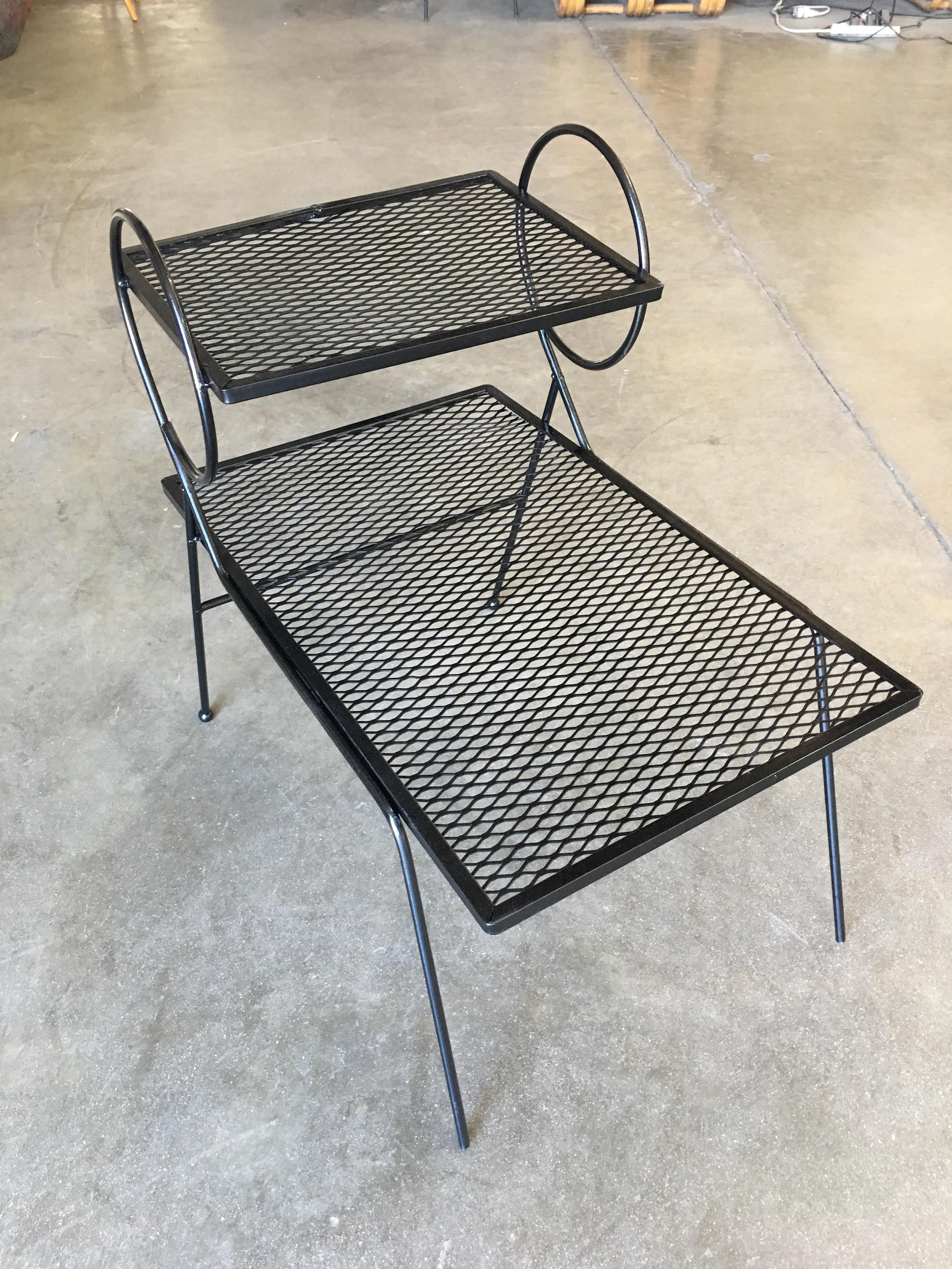 Vintage outdoor/patio Art Deco side tables with circle legs and steel mesh top by the Woodward company, circa 1940 and made in the USA by Woodard. All outdoor furniture can be repainted in the color of your choice at no extra charge.