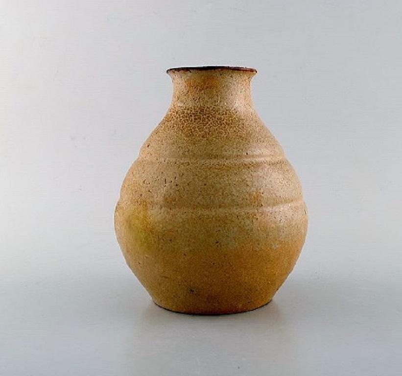Early unique Patrick Nordstrom, own workshop, pottery vase.
Beautiful glaze in earthy colors, 1910s.
Signed.
Measures: 17.5 x 15 cm.
In perfect condition.
