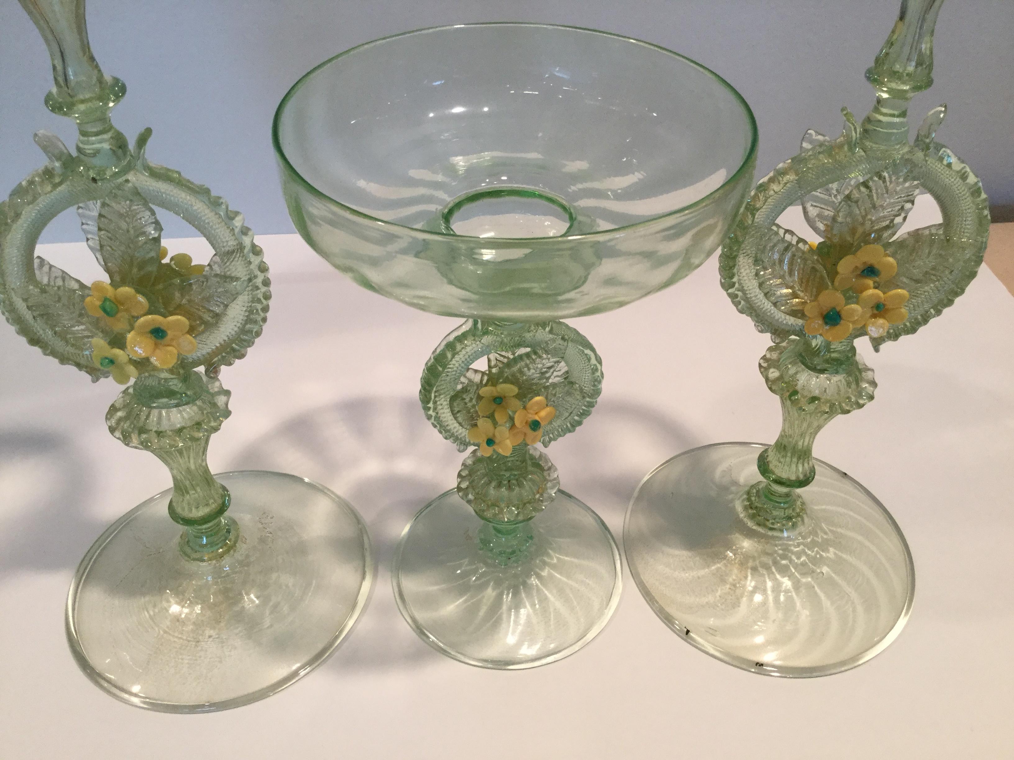 Very early Venetian glass console set circa 1880-1910. Large decorative candle holders with matching bowl.