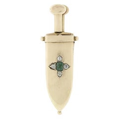 Spilla taglia-sigari in oro smeraldo e diamanti in oro 14 ct.