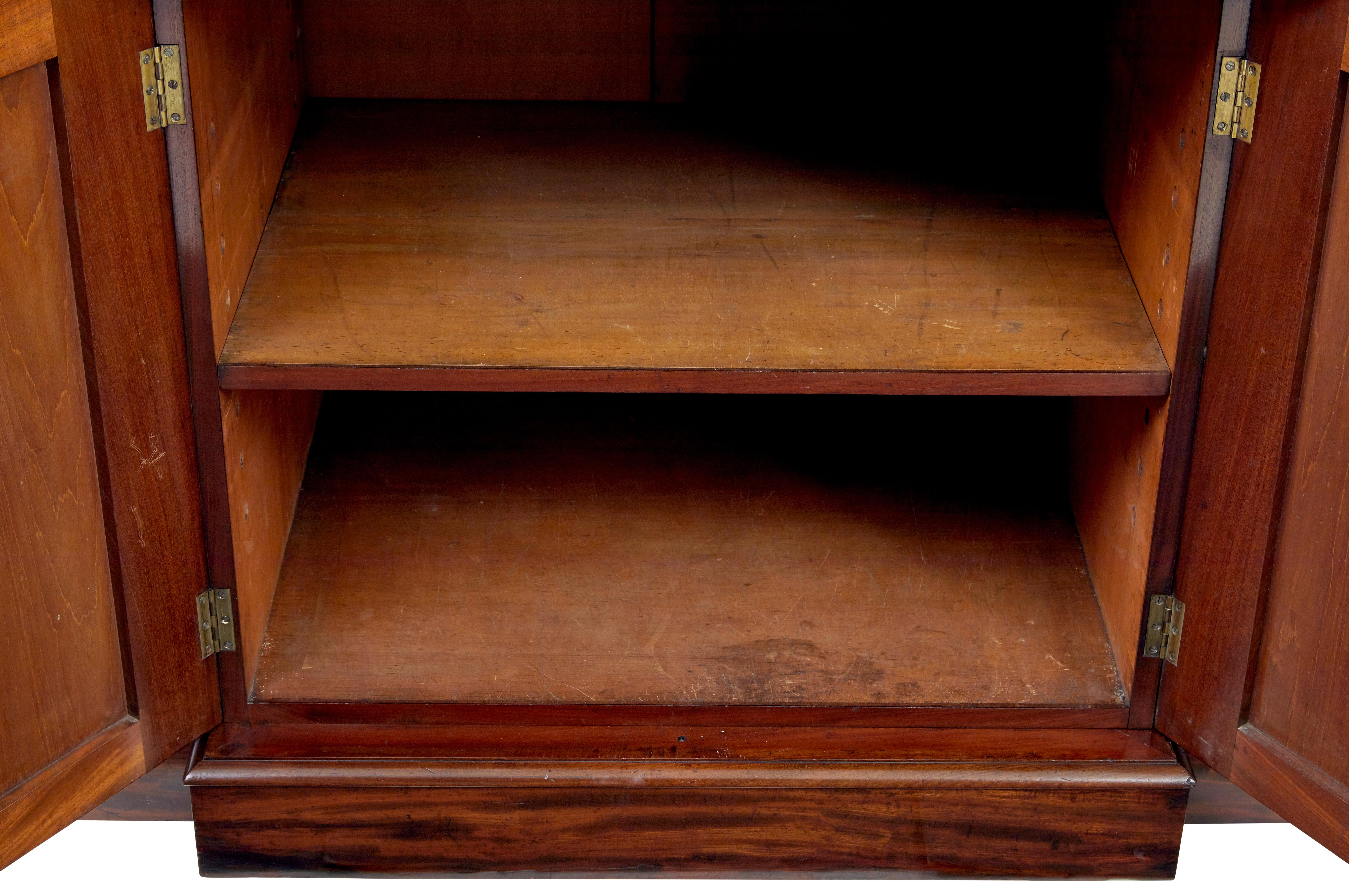 Early Victorian 19th century flame mahogany breakfront bookcase For Sale 3
