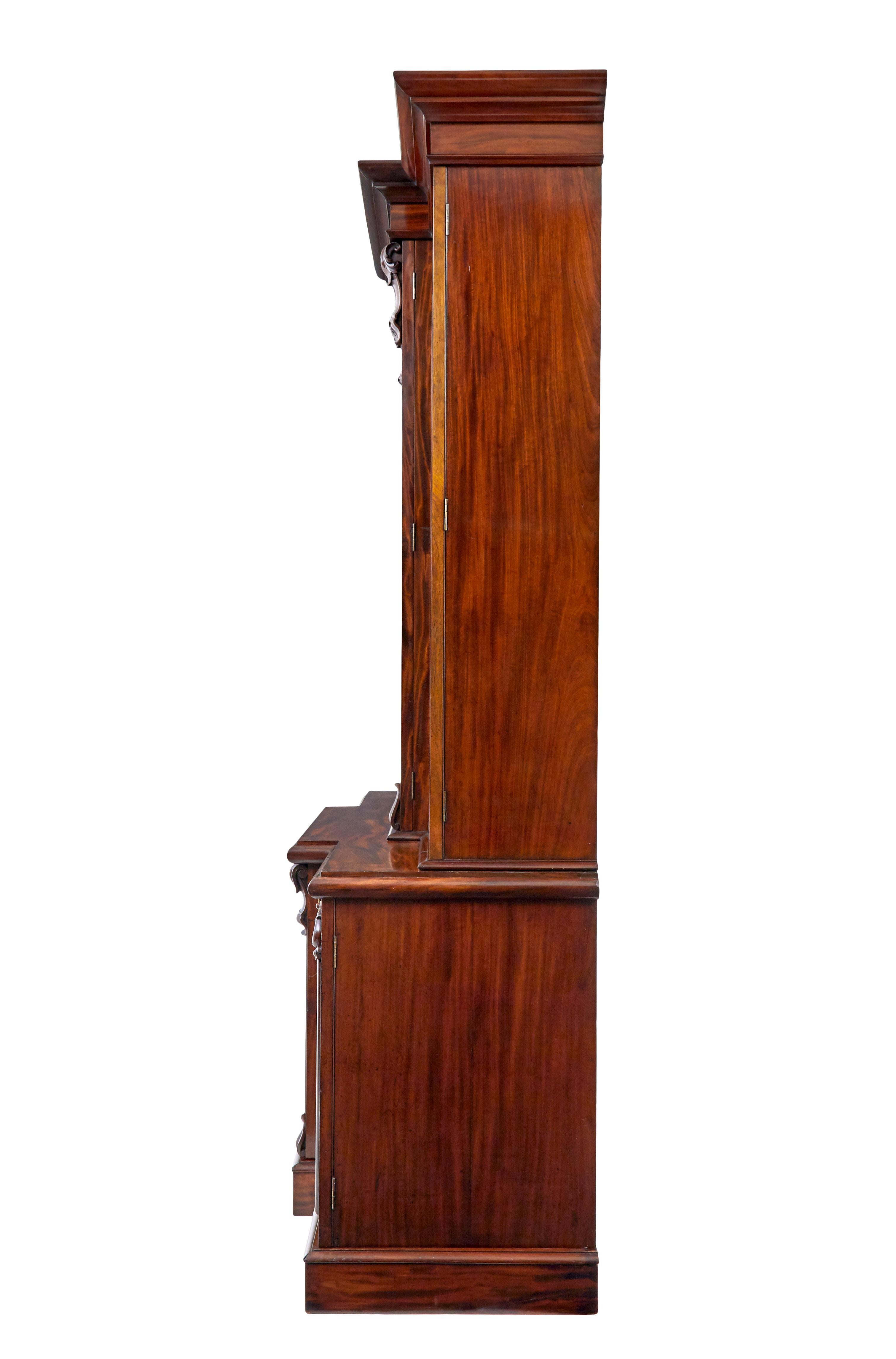 Glass Early Victorian 19th century flame mahogany breakfront bookcase For Sale