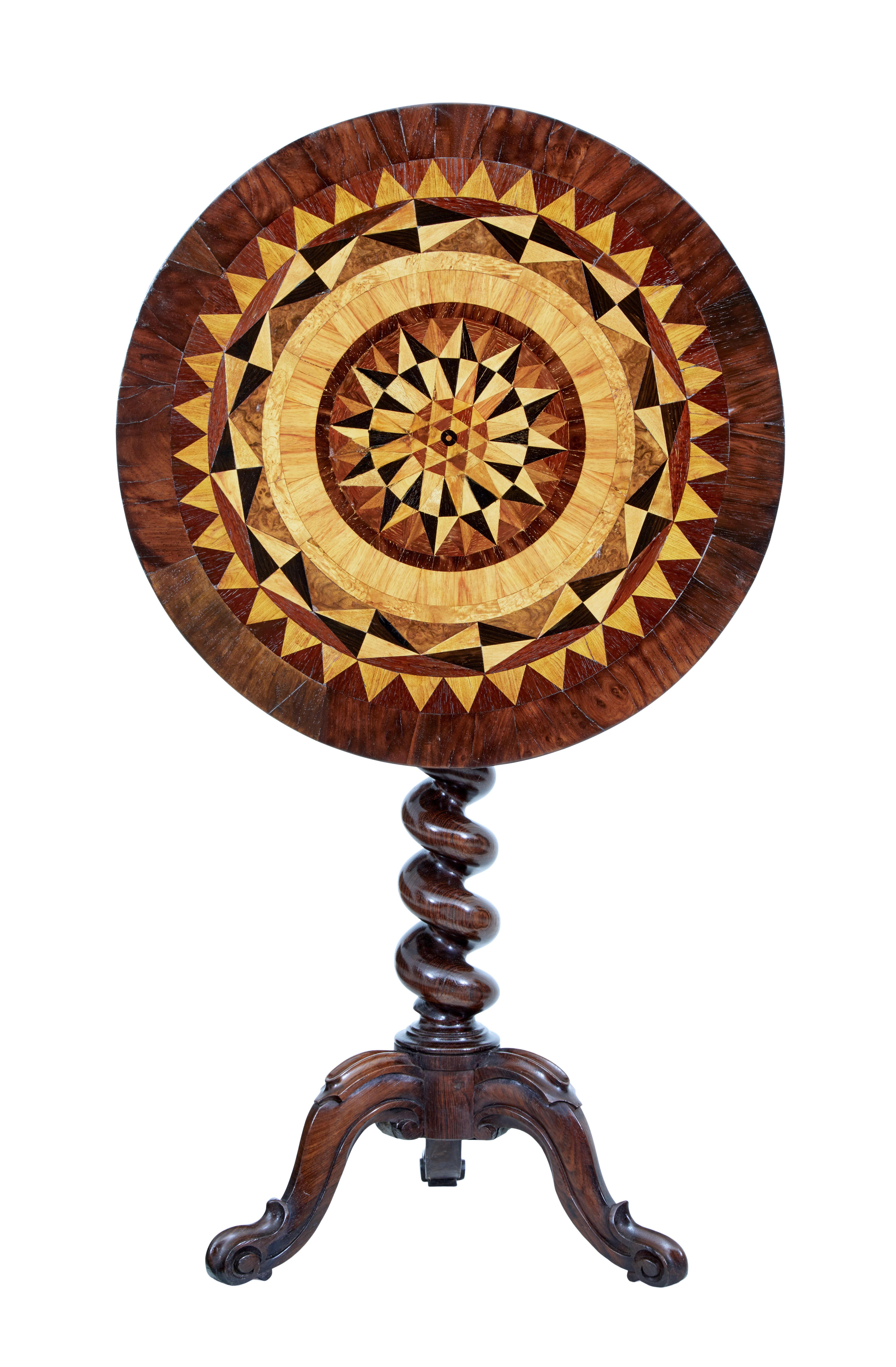 Early Victorian 19th century walnut inlaid tilt top occasional table circa 1840.

Beautifully inlaid in a symmetrical pattern with walnut, birch, coromandel and various burrs, with outer walnut edge.

Top tilts for display and