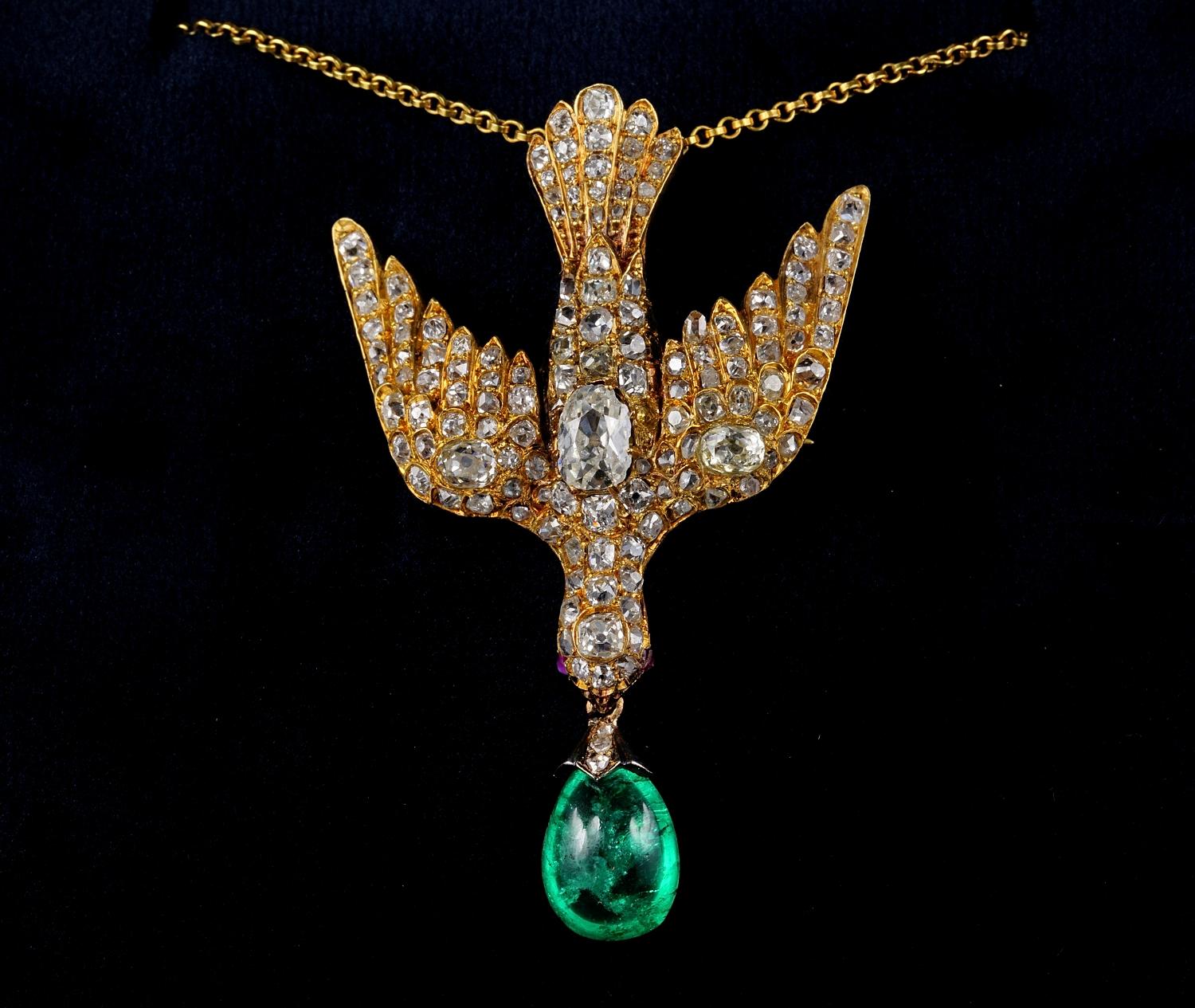 Rare Holy Dove Saint Esprit Early Victorian pendant

A magnificent Saint Esprit dove pendant from the early Victorian era (1840 ca)
Totally hand made during the time of solid 19 KT gold – tested 
Masterful art work, richly set with old mine cut