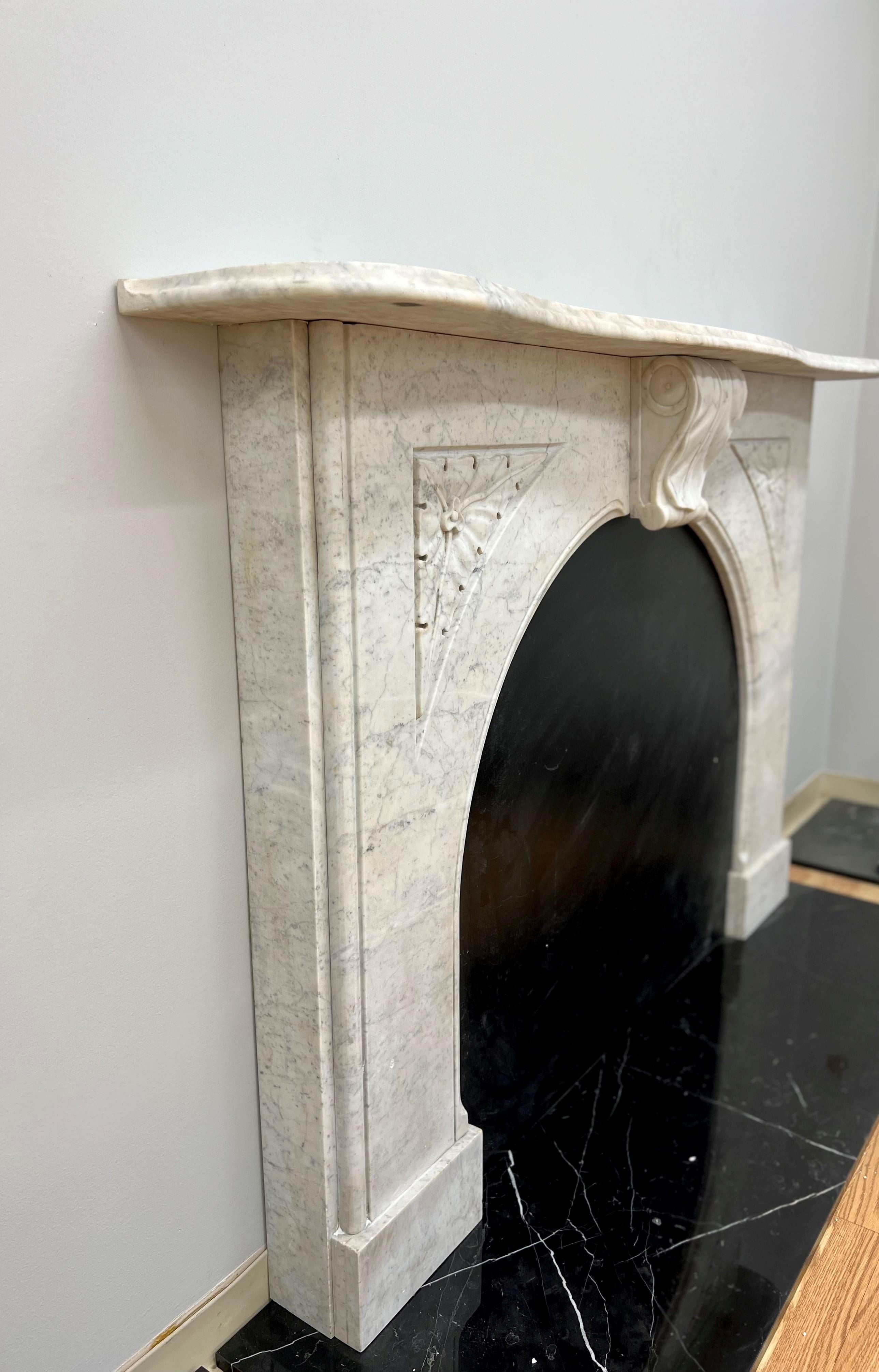 European Early Victorian Arched Mantelpiece in Carrara Marble For Sale