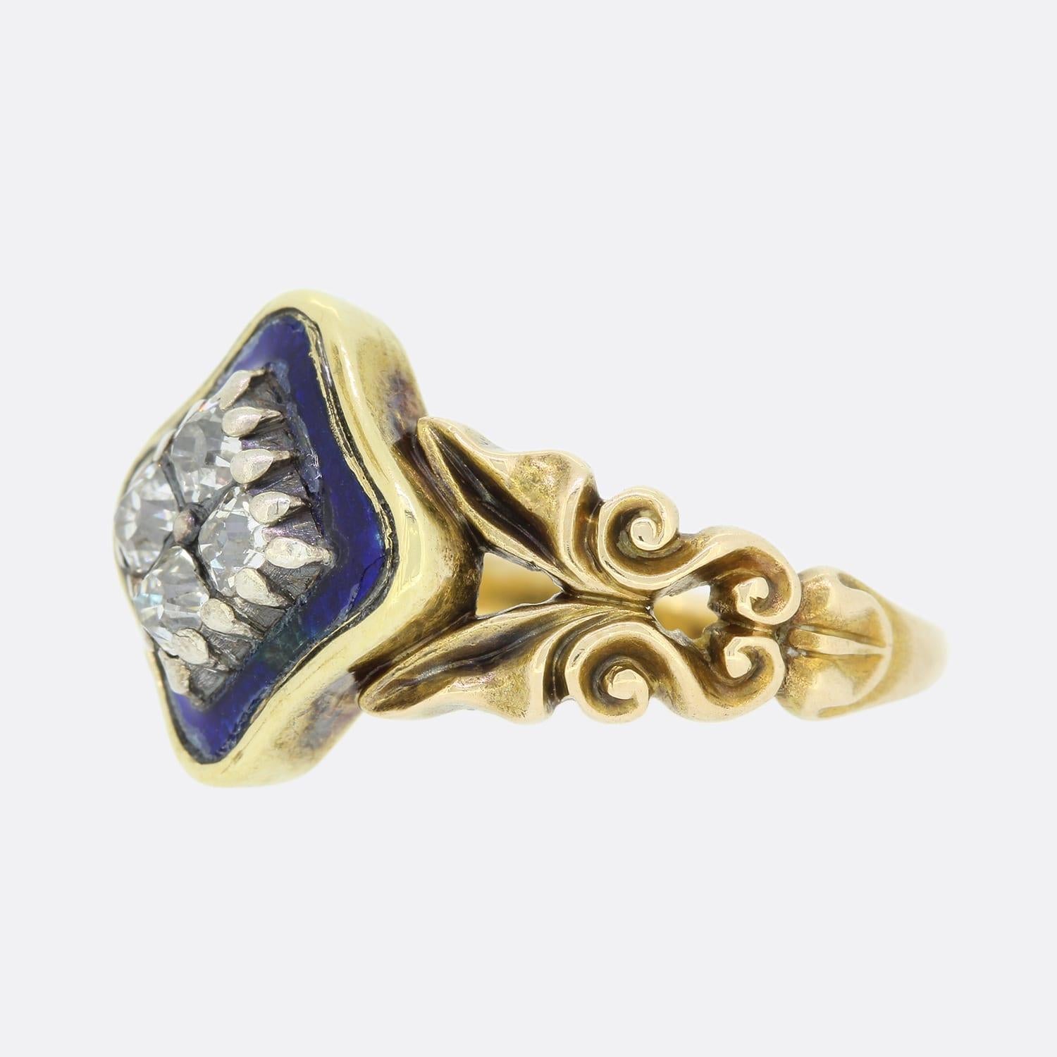 This is a wonderful blue enamel and diamond ring from the Early Victorian era. The 4 old cut diamonds sit in silver cut-down collet settings and are surrounded by a blue enamel border. The ring is excellently crafted and features beautifully