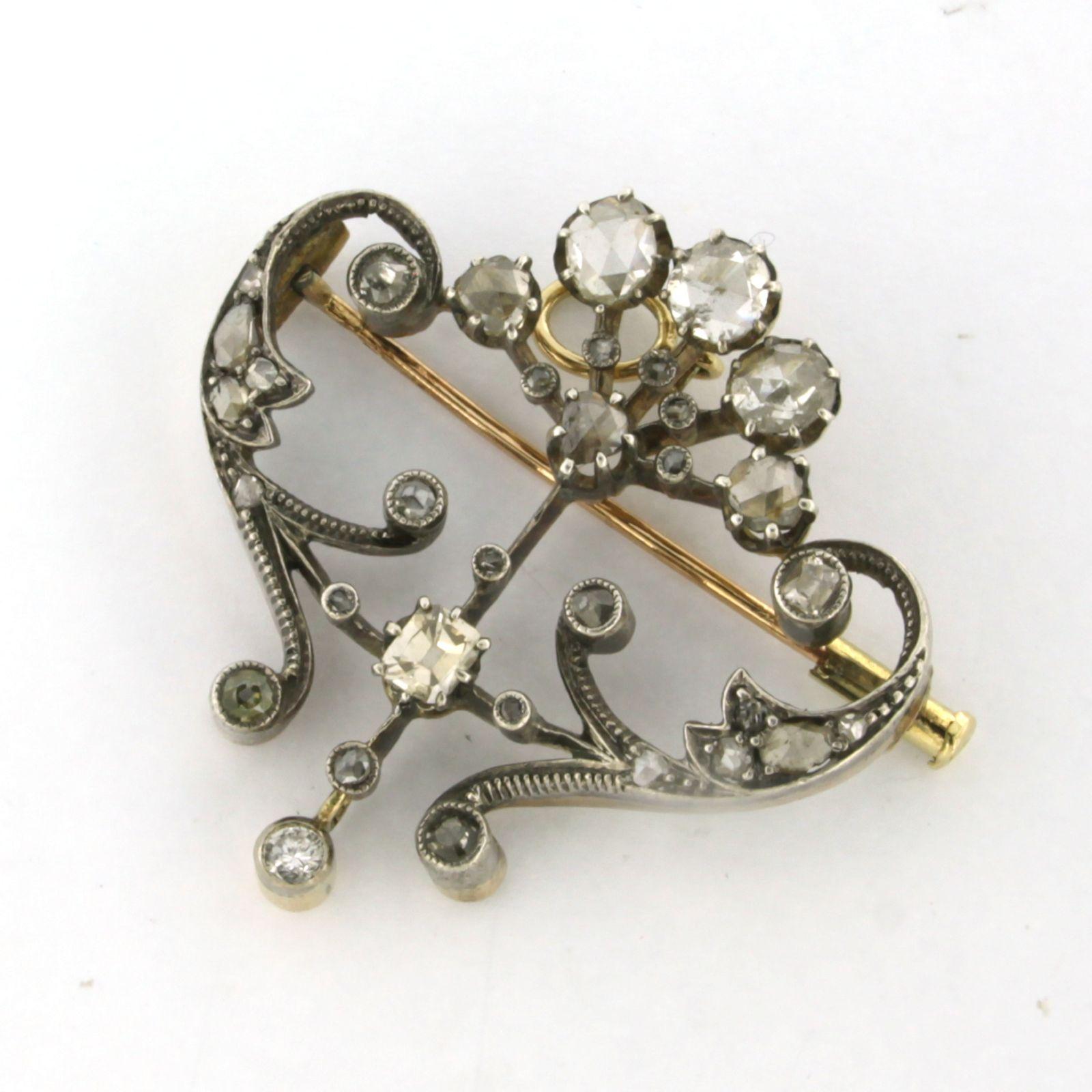 Women's Early Victorian brooch with old mine and rose cut diamonds 14k gold and silver