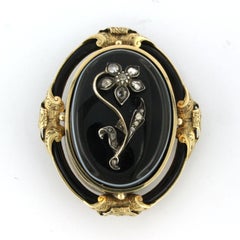 Early Victorian brooch with onyx and rose cut diamonds 14k gold and silver