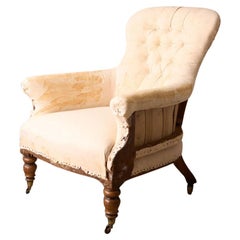 Early Victorian buttoned back country house armchair